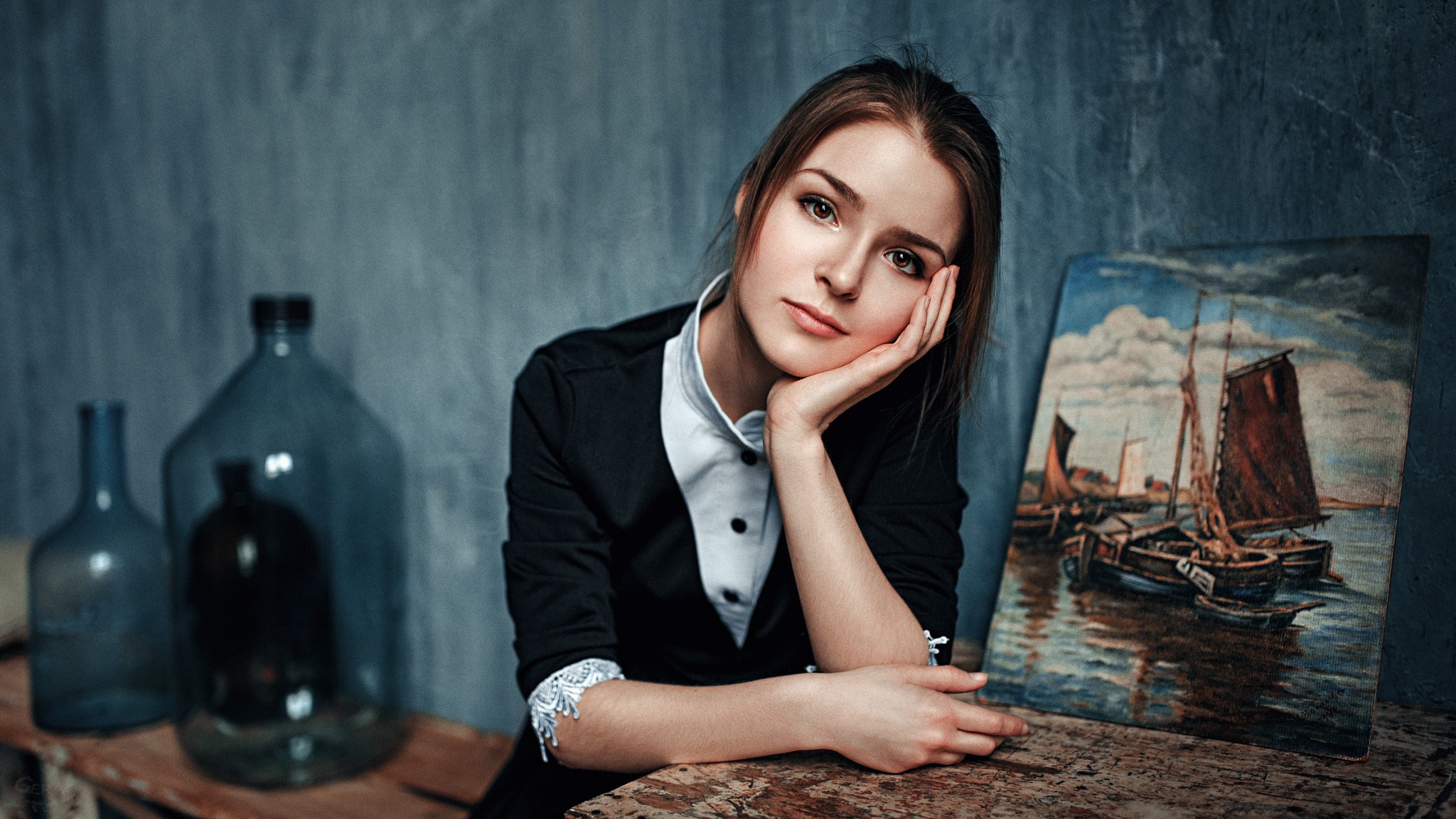 Julia Tavrina posing with a painting and bottles HD Wallpaper