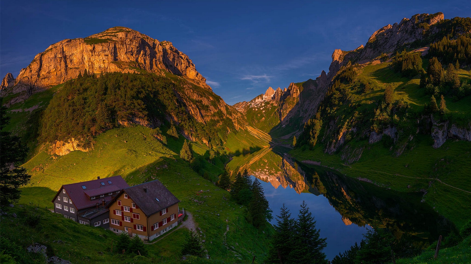 Mountain lake with houses and reflection at sunrise HD Wallpaper