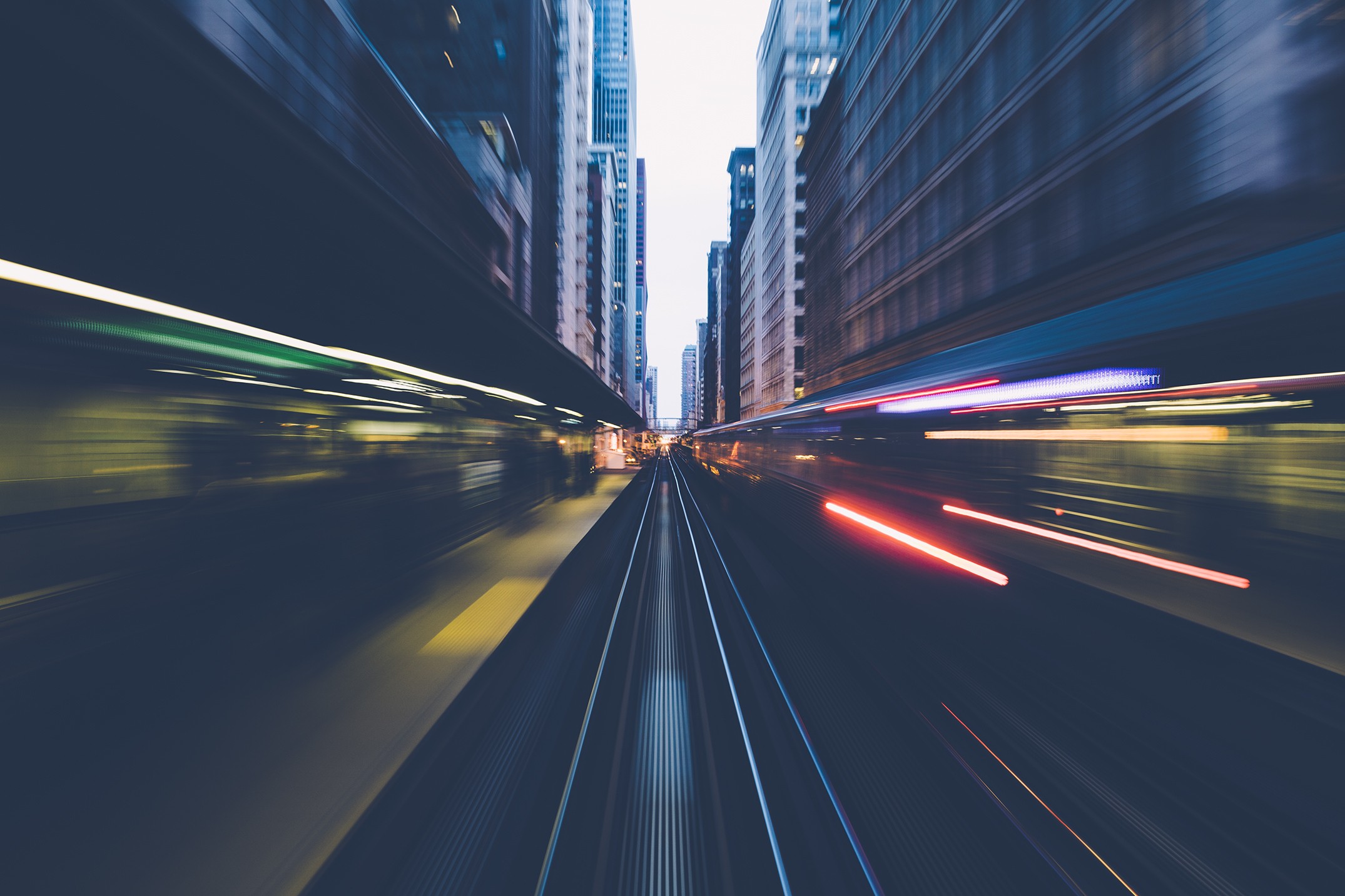City street with light trails at night HD Wallpaper