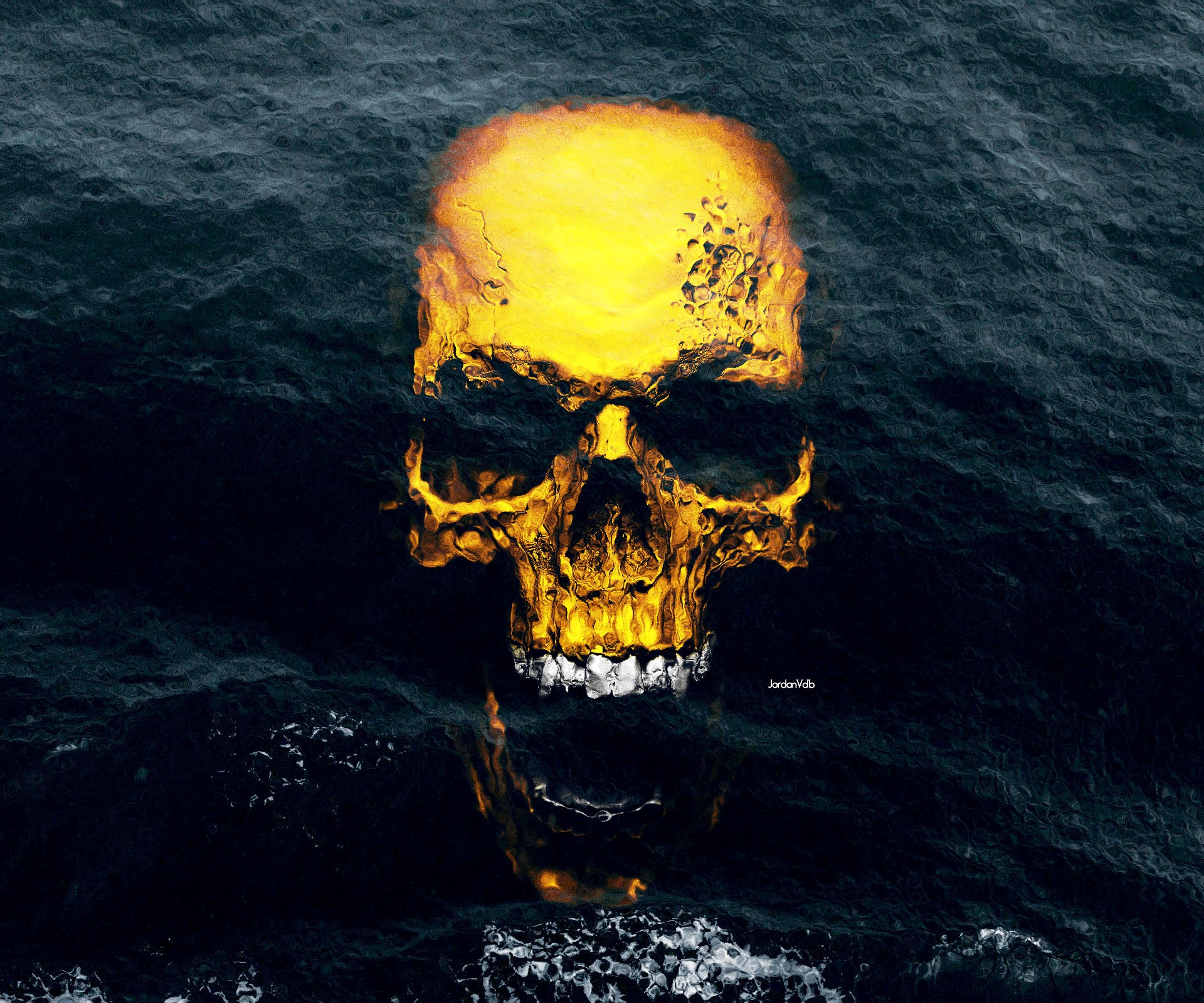 Golden skull emerging from dark ocean waves HD Wallpaper