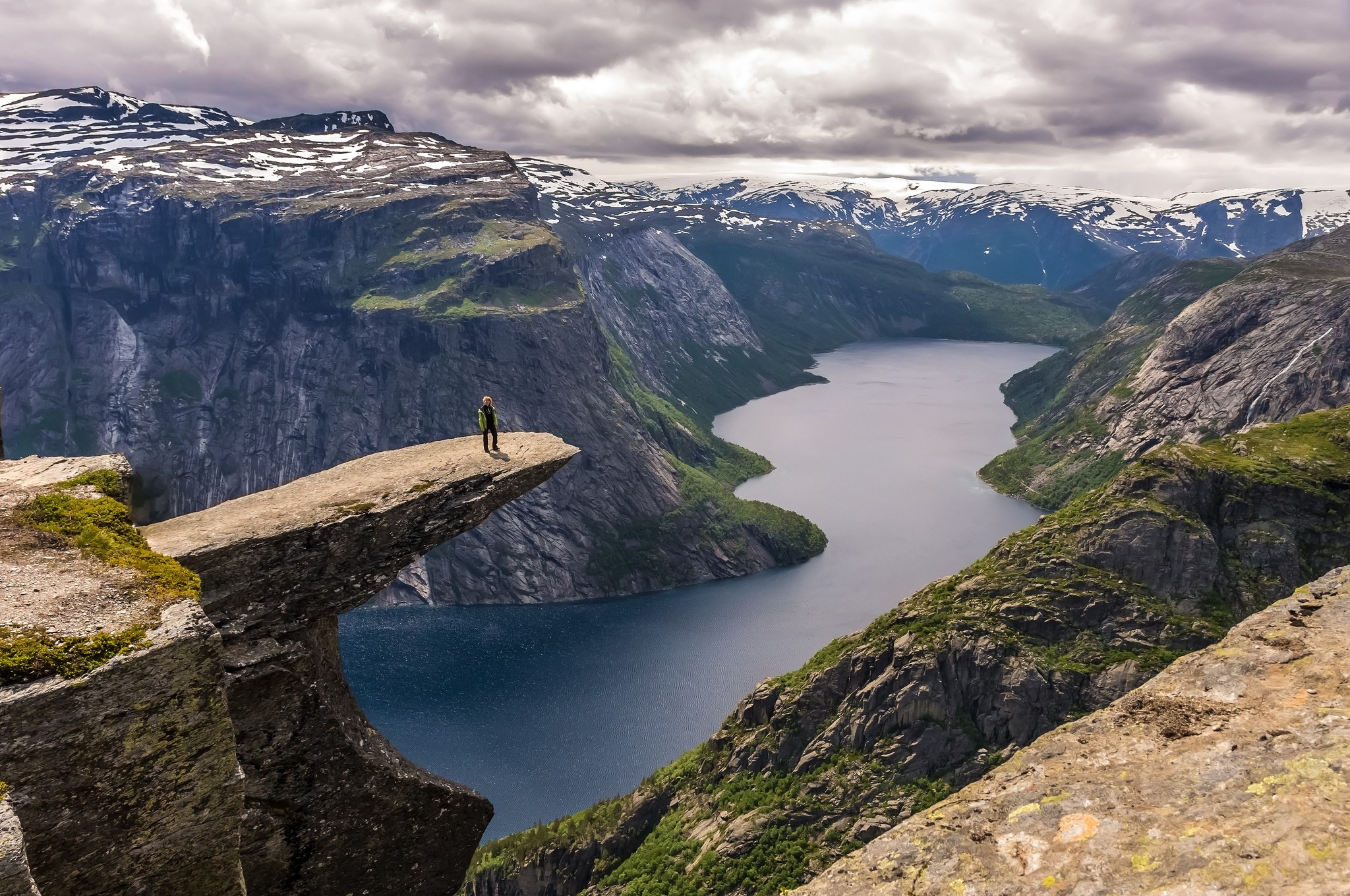 Woman on Trolltunga rock in Norway HD Wallpaper
