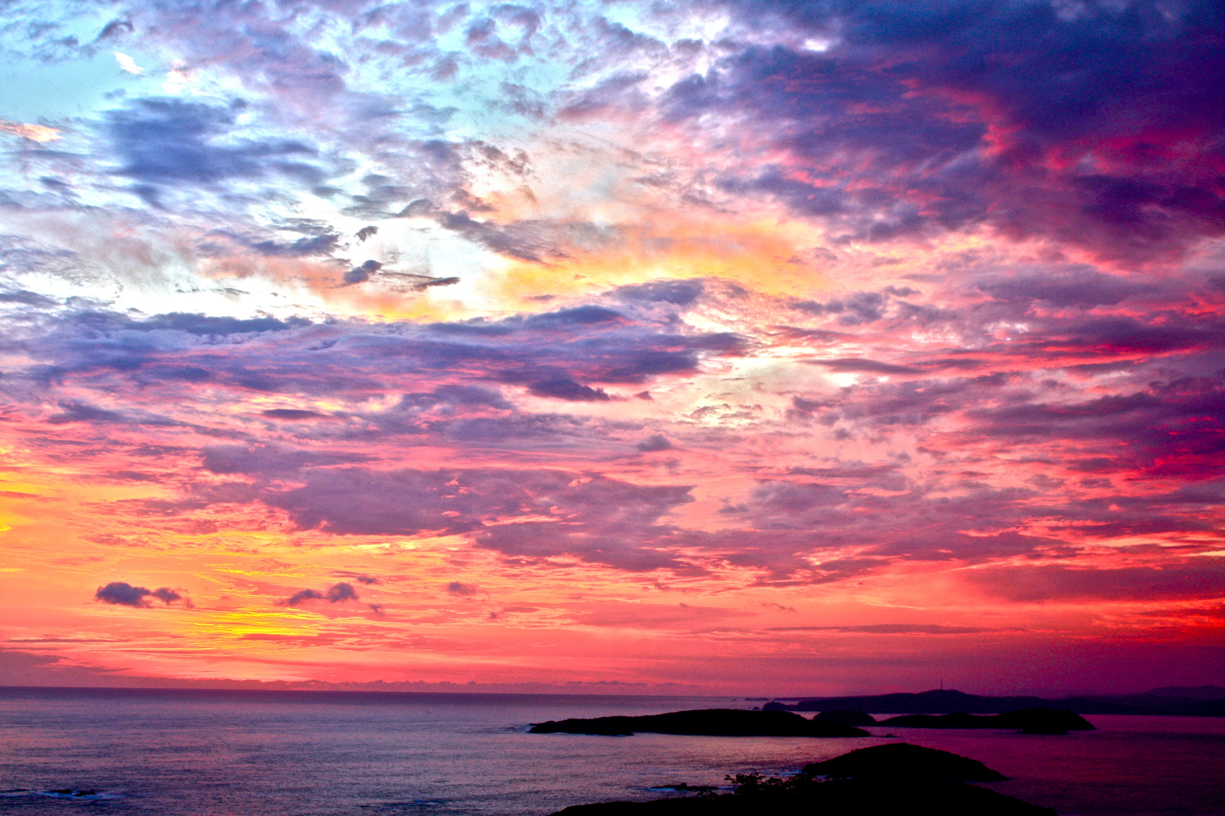 Colorful sunset over islands and the sea HD Wallpaper