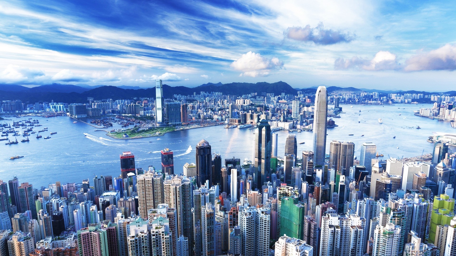 Hong Kong skyline with Victoria Harbour and mountains HD Wallpaper