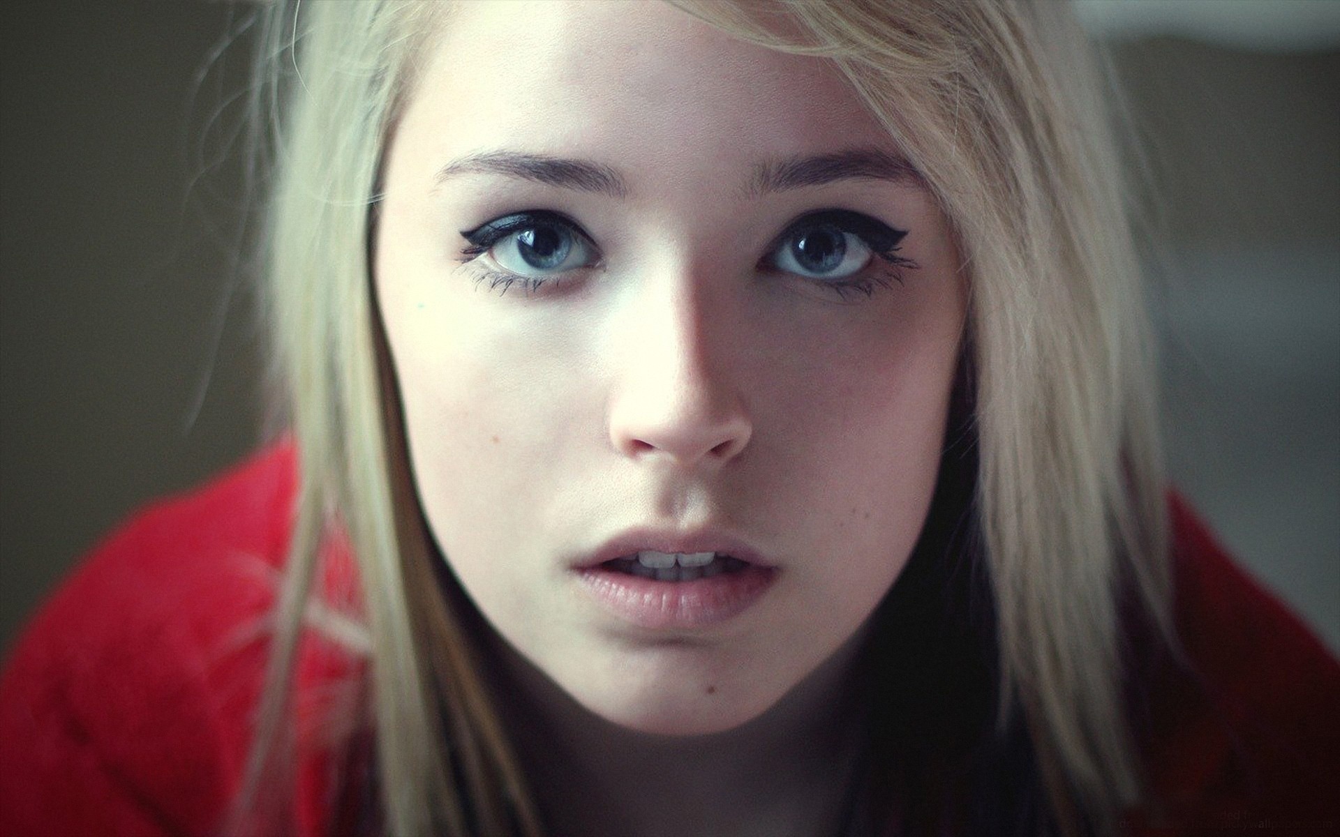 Young woman with blonde hair and blue eyes HD Wallpaper