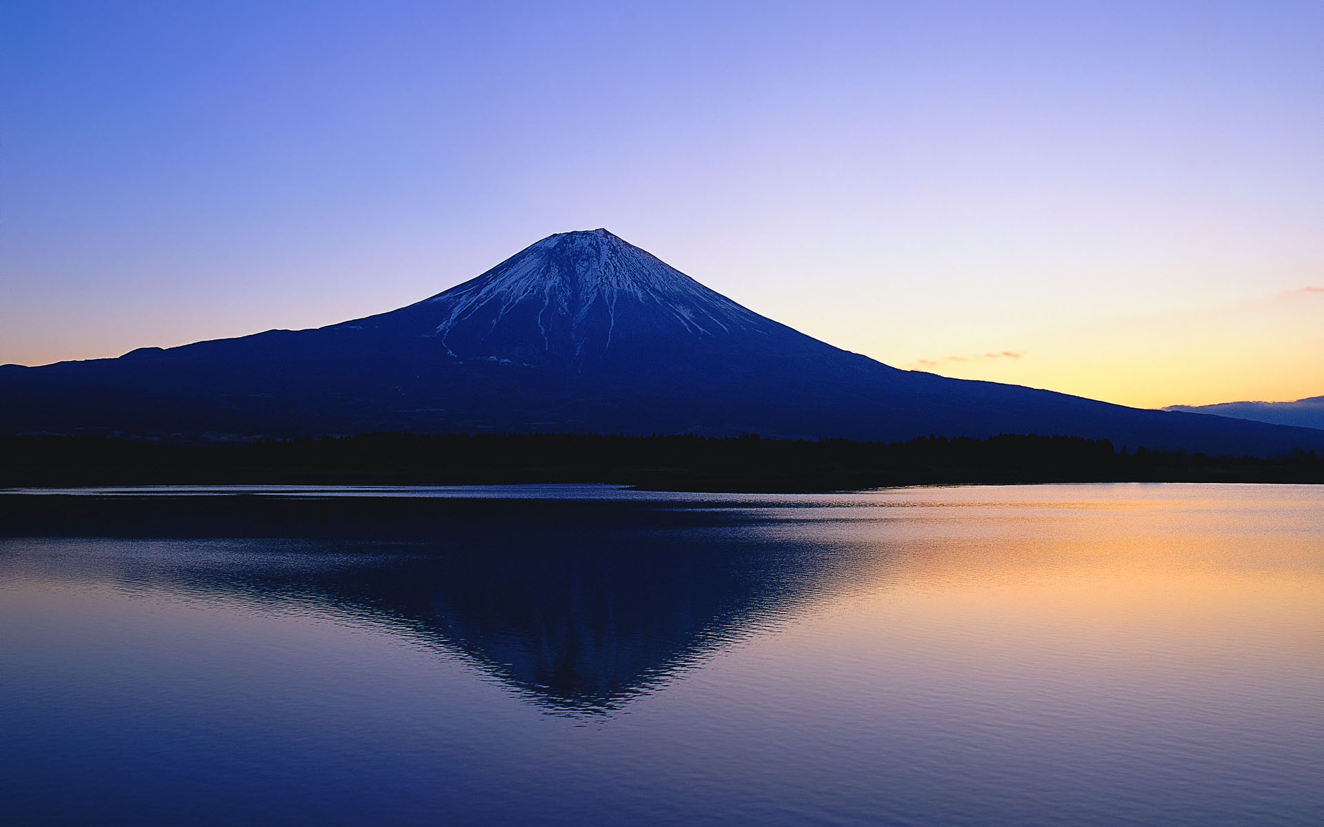 Mount Fuji reflected in a lake at dusk HD Wallpaper
