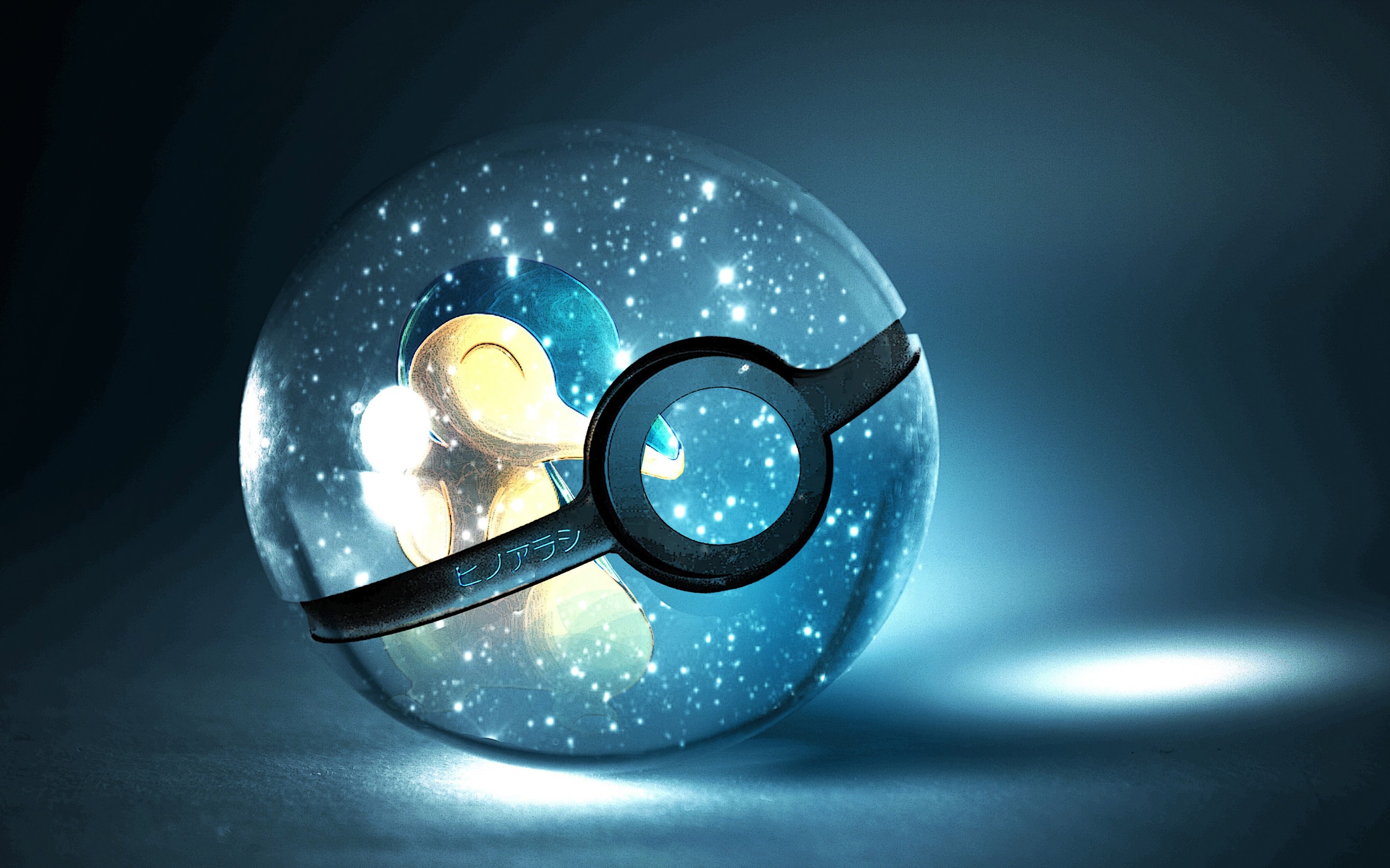 Cyndaquil inside a glowing Poké Ball HD Wallpaper