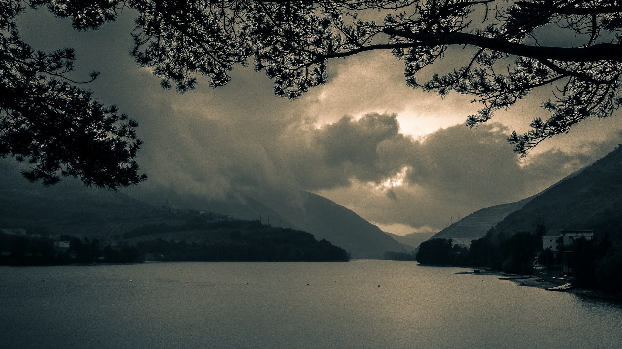 Lake and mountains under cloudy sky in Italy HD Wallpaper