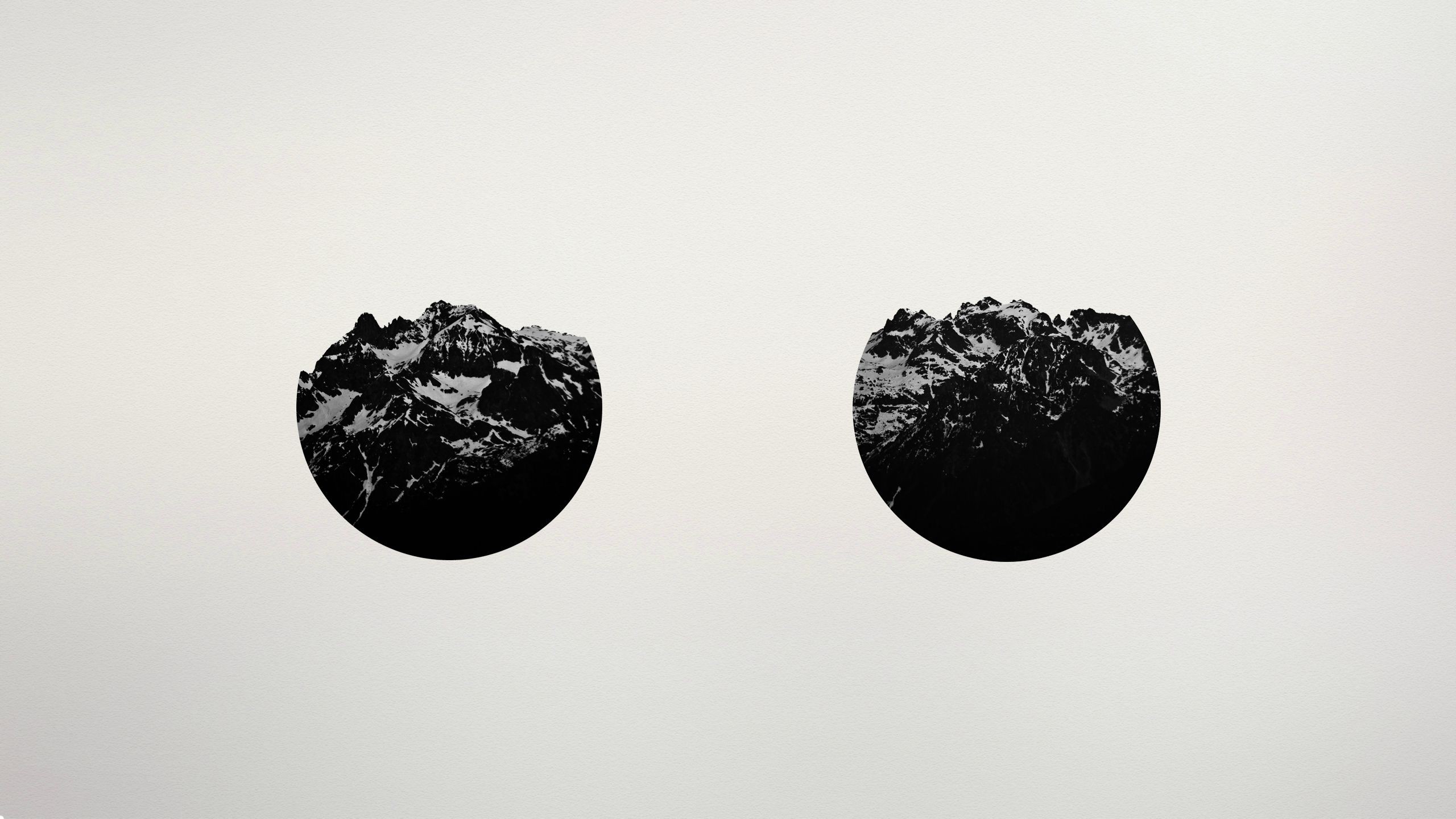 Two circular mountain landscapes in black and white HD Wallpaper