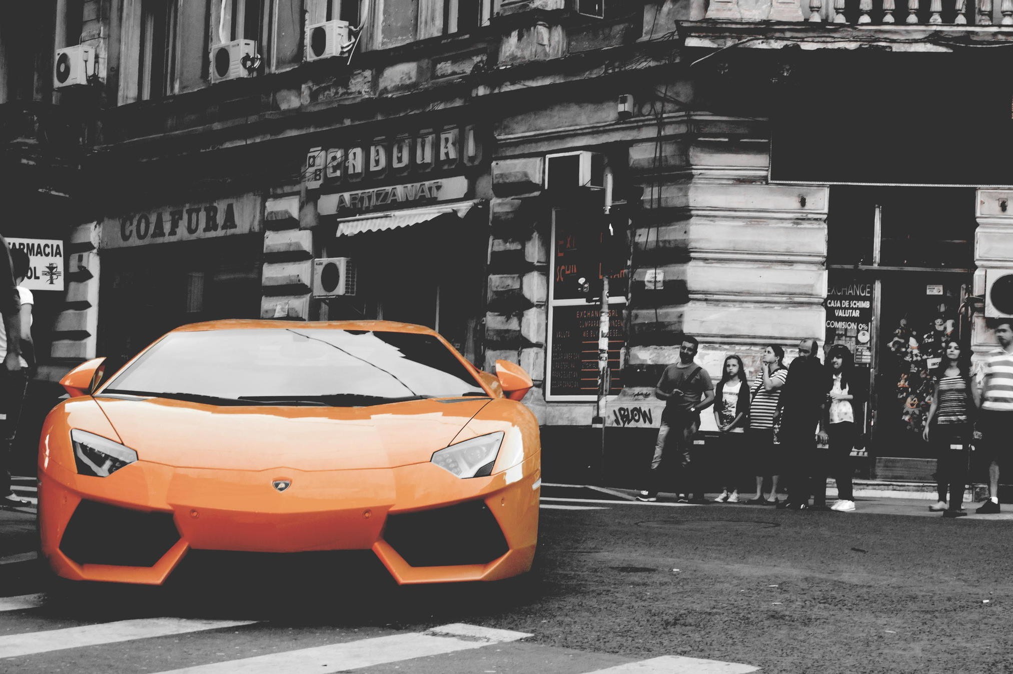 Orange Lamborghini Aventador parked on a street HD Wallpaper