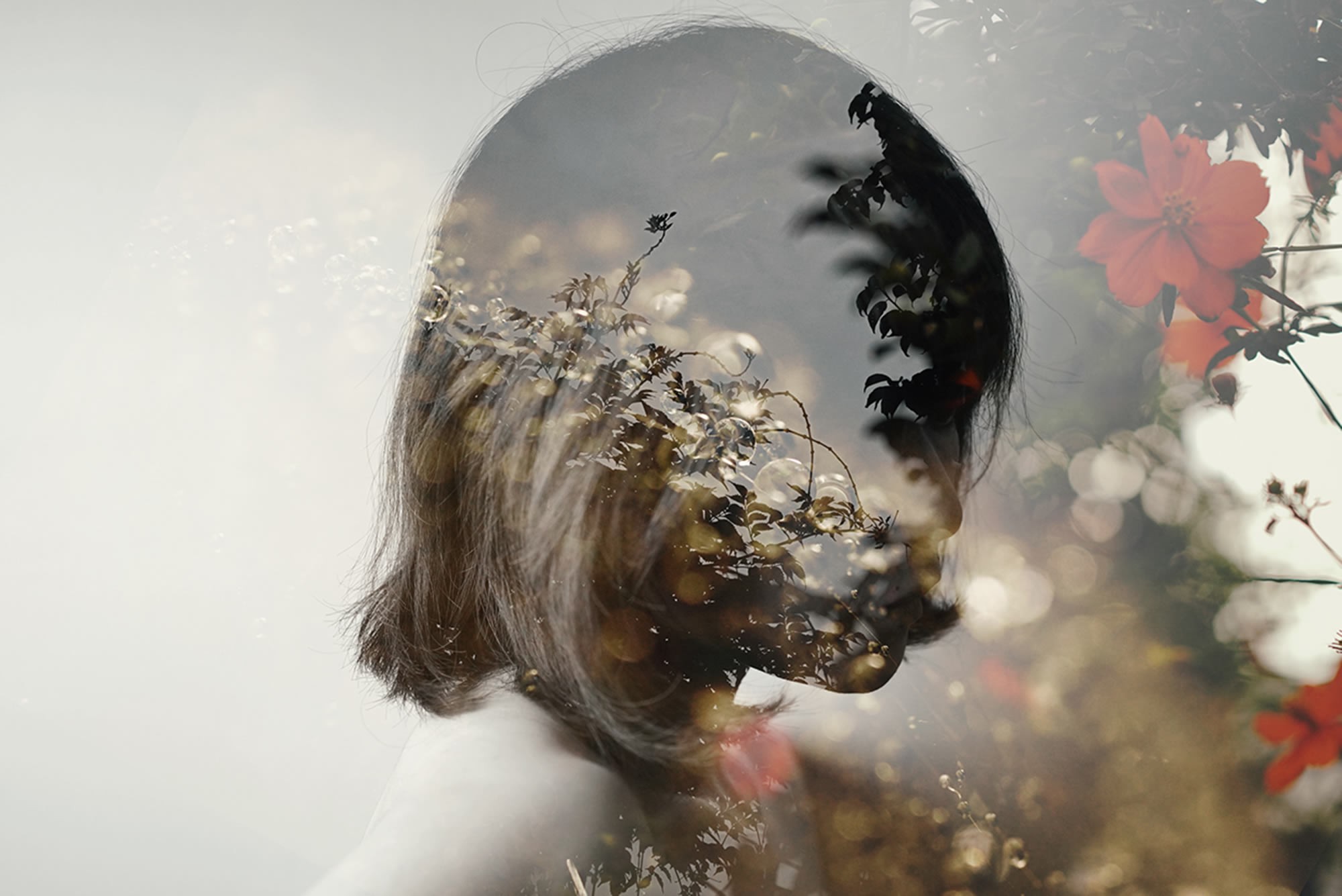 Double exposure of a woman with flowers and plants HD Wallpaper