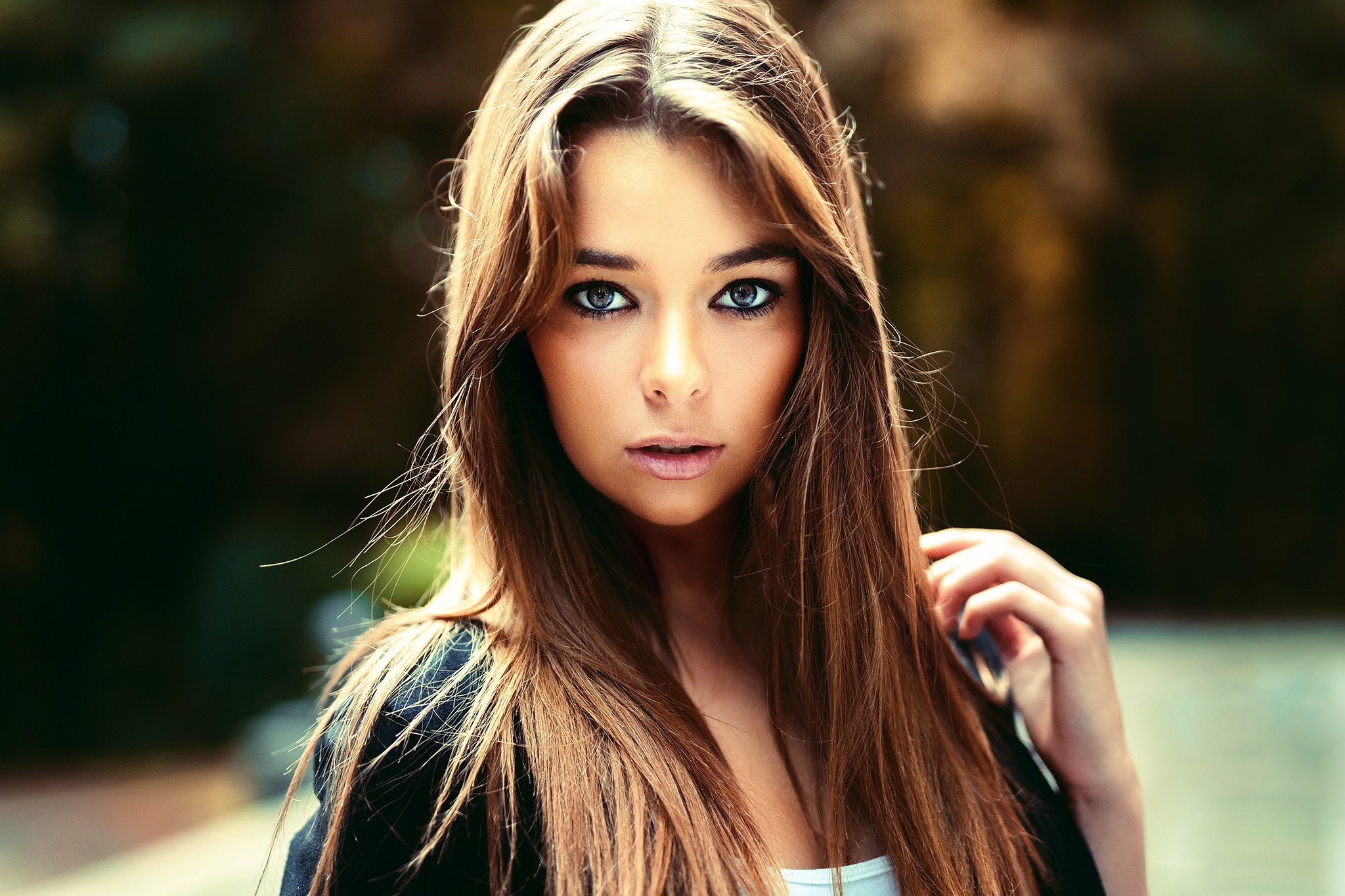 Portrait of a young woman with long brown hair HD Wallpaper