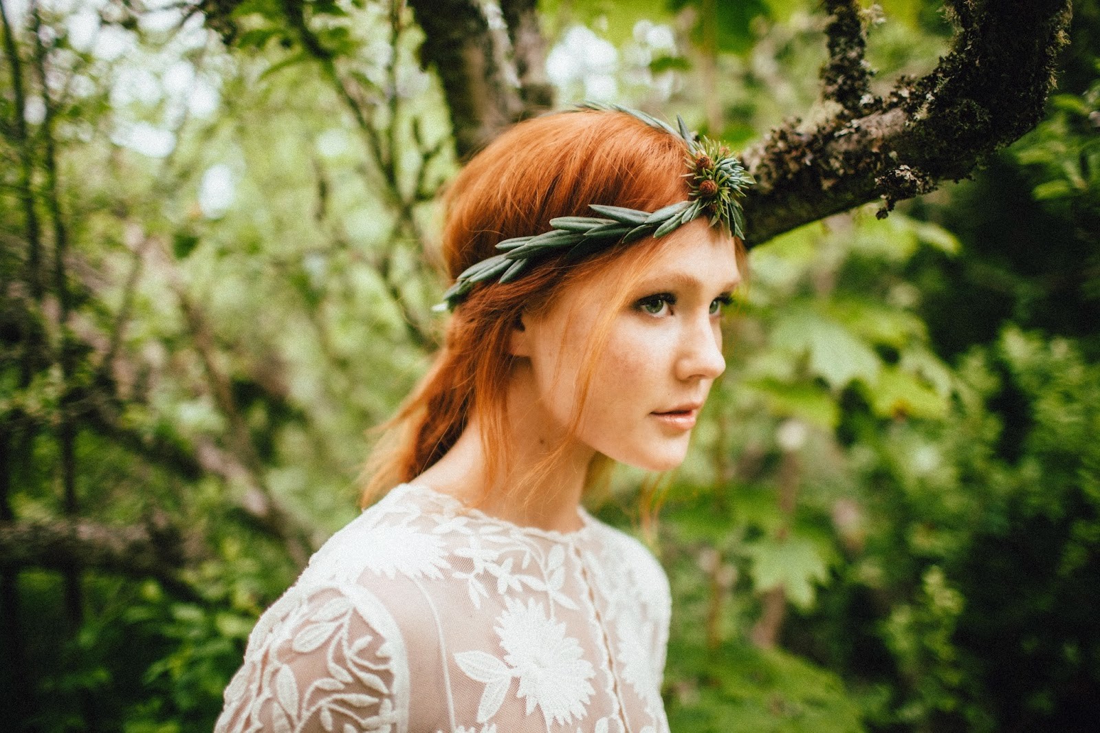 Woman with red hair and a floral crown in a forest HD Wallpaper