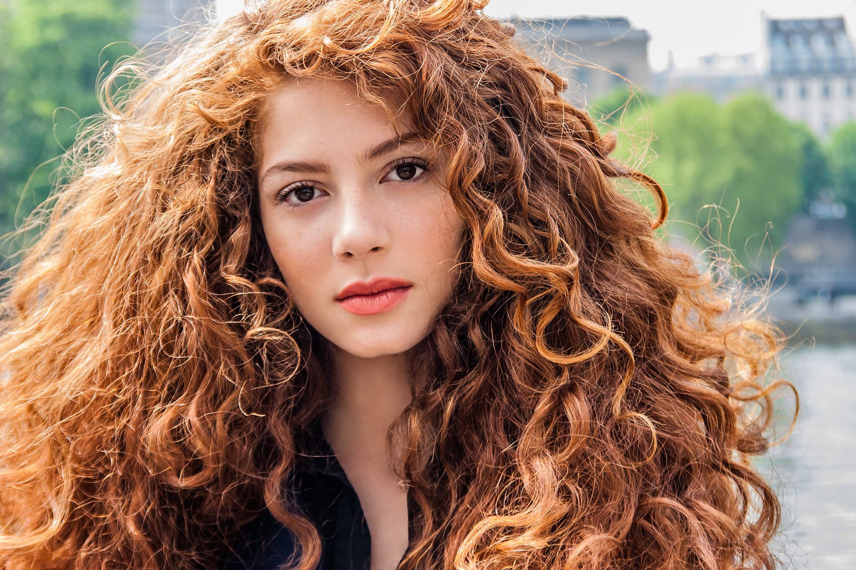 Jenna Thiam with long curly red hair HD Wallpaper
