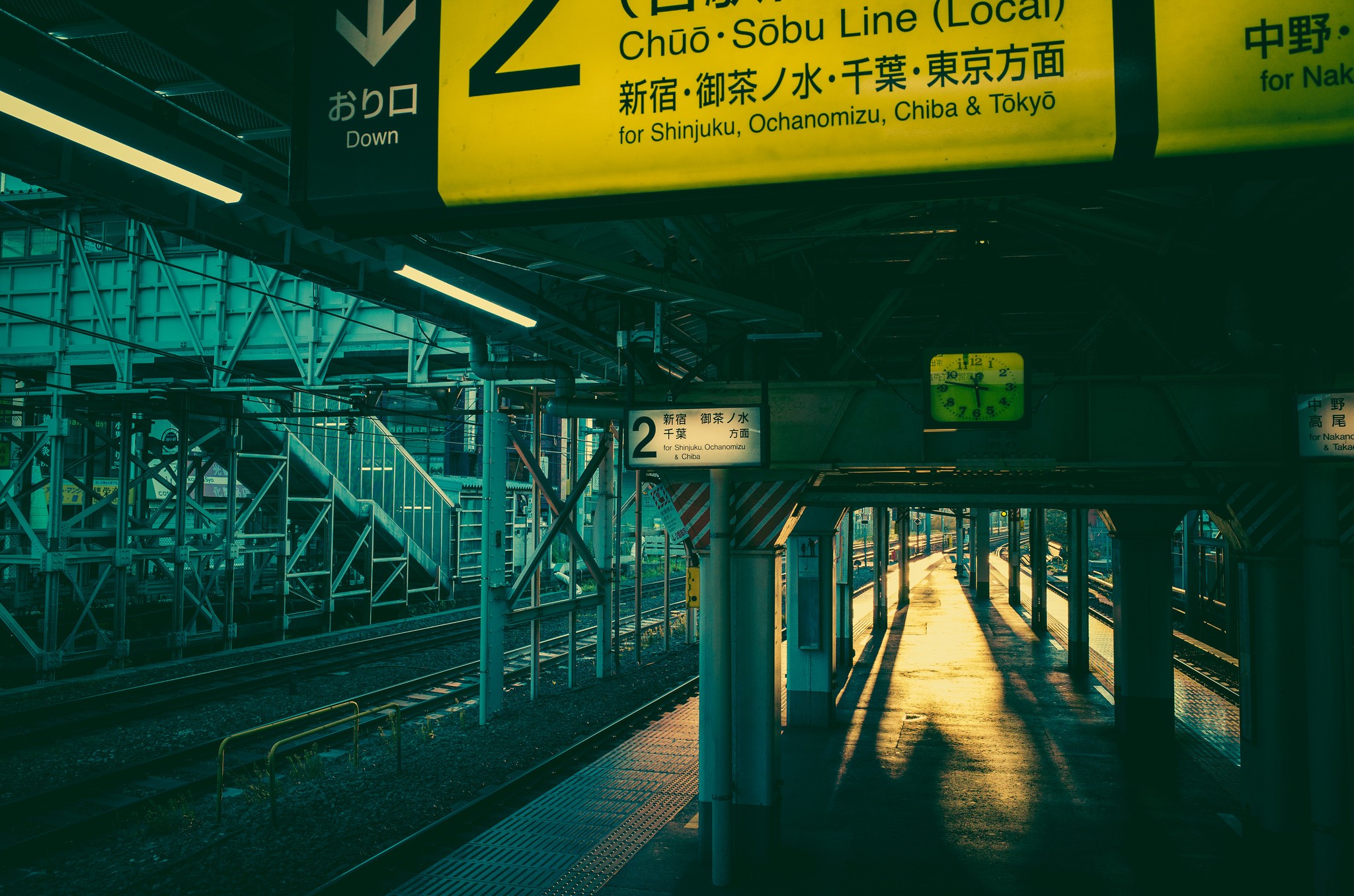 Train station platform with Chuo-Sobu Line signage HD Wallpaper