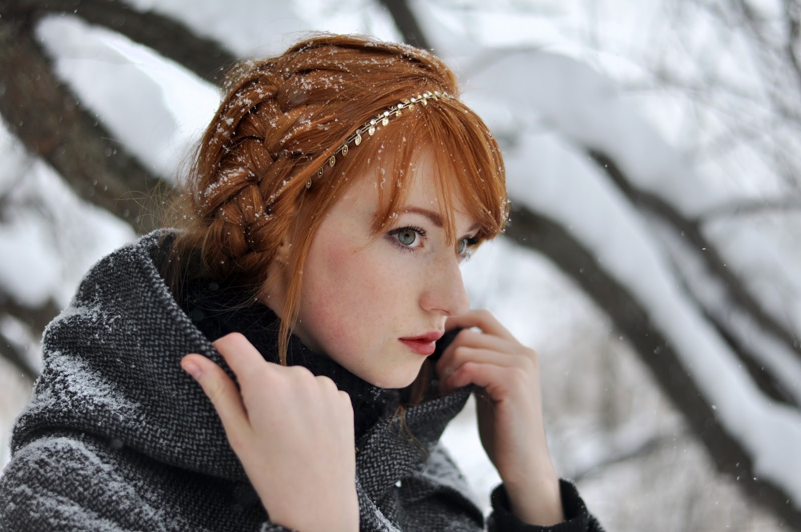 Redhead woman with braids in a grey coat in the snow HD Wallpaper