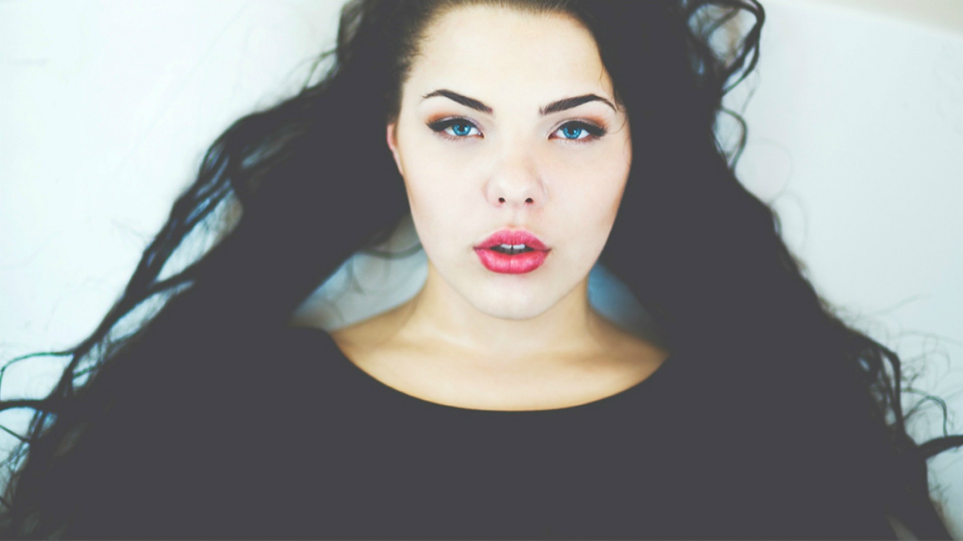 Woman with long black hair and blue eyes HD Wallpaper