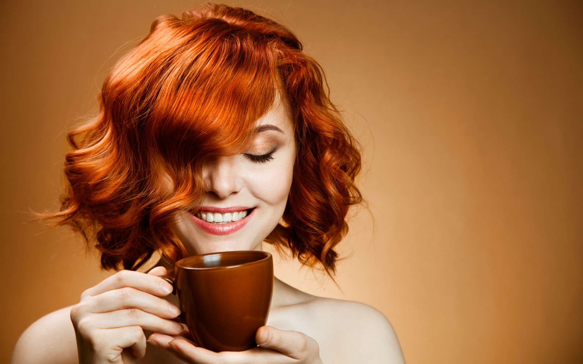 Woman with red curly hair holding a coffee cup HD Wallpaper