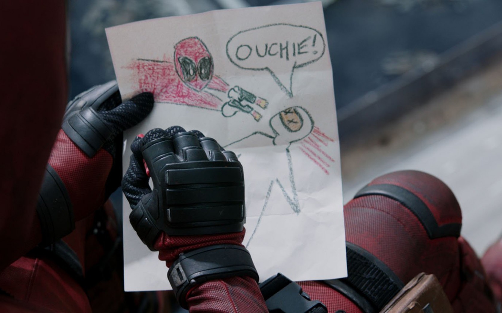 Deadpool holding a drawing of himself shooting someone HD Wallpaper