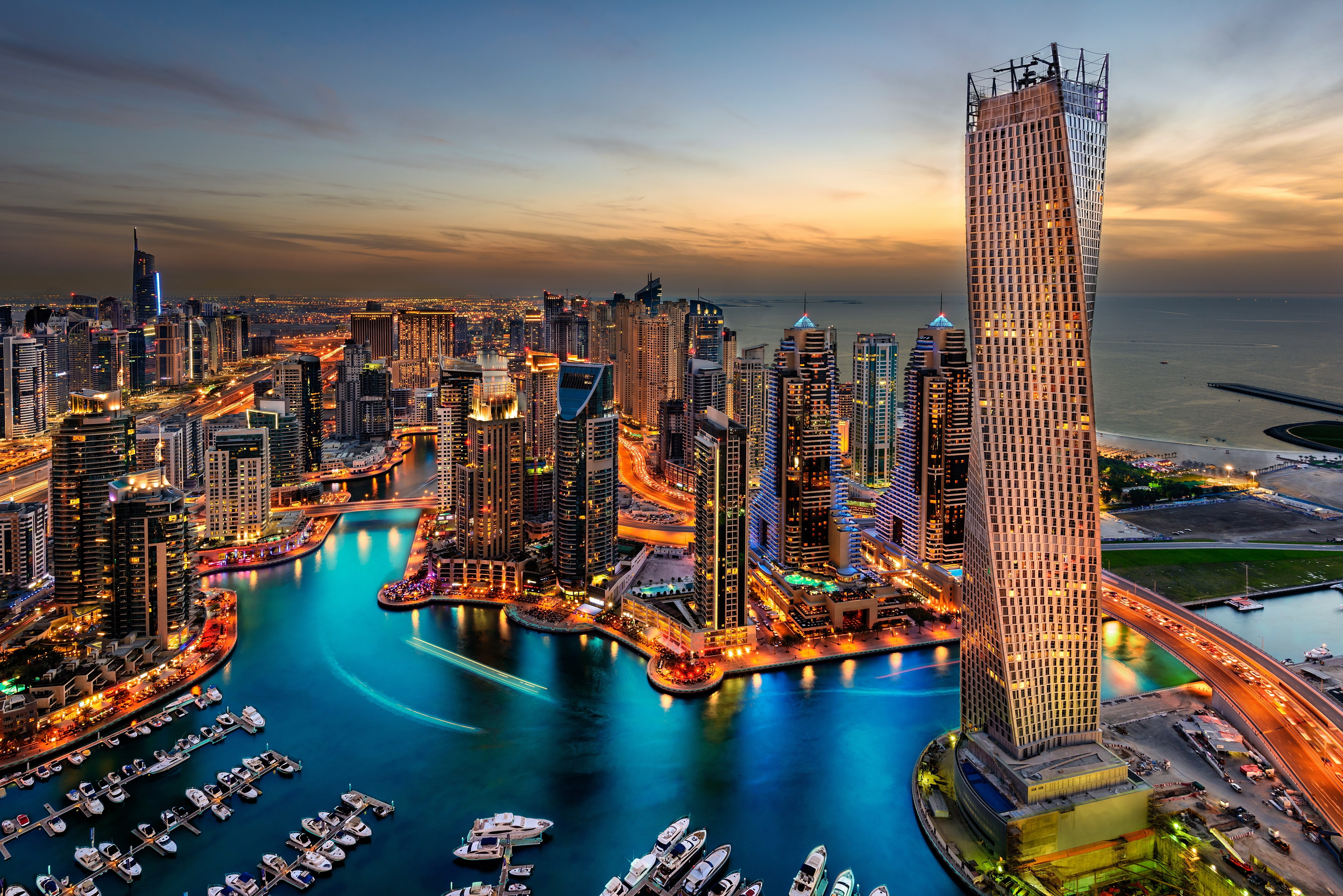 Dubai Marina skyscrapers and waterway at dusk HD Wallpaper