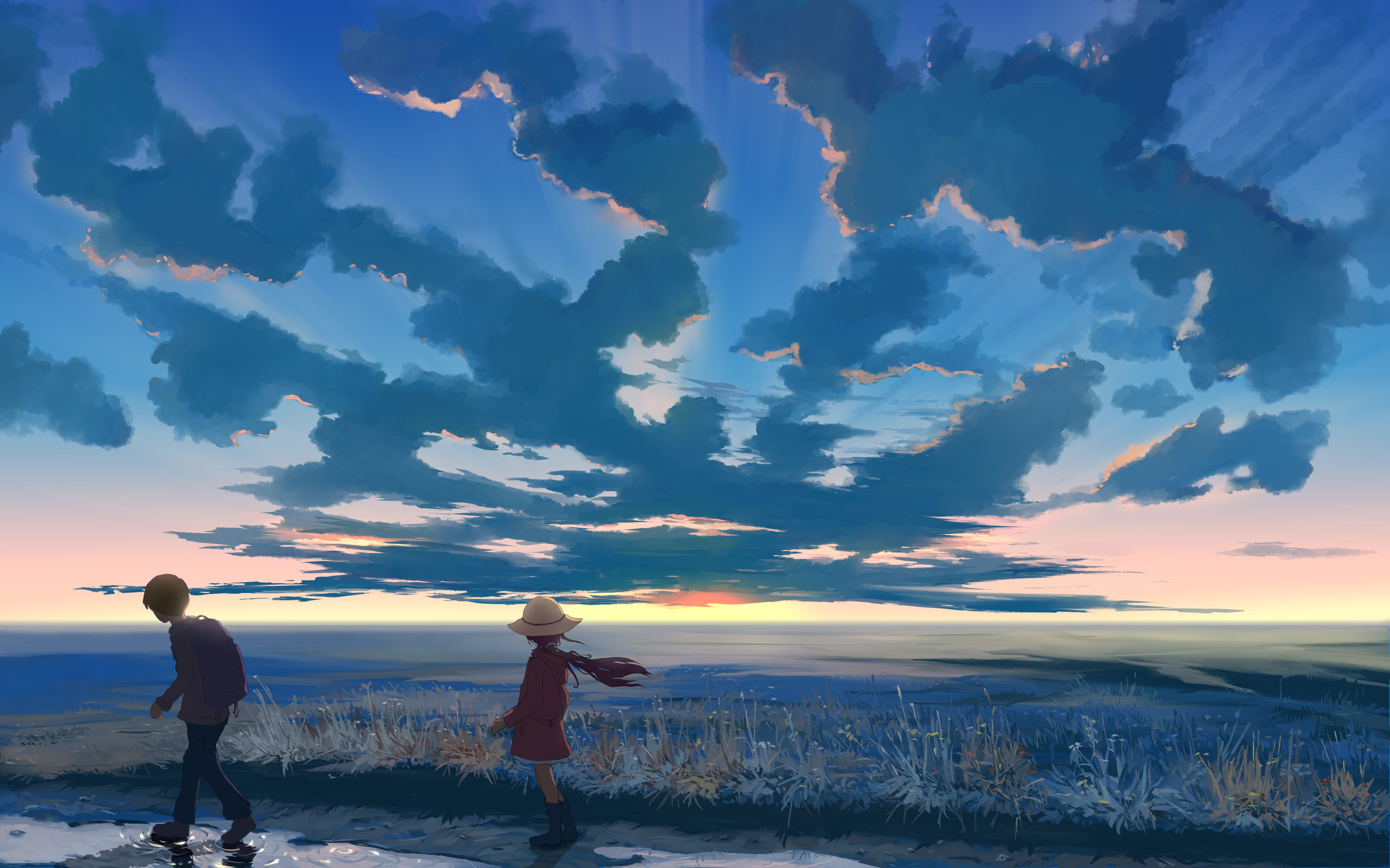 Two children walking by the sea at sunset HD Wallpaper