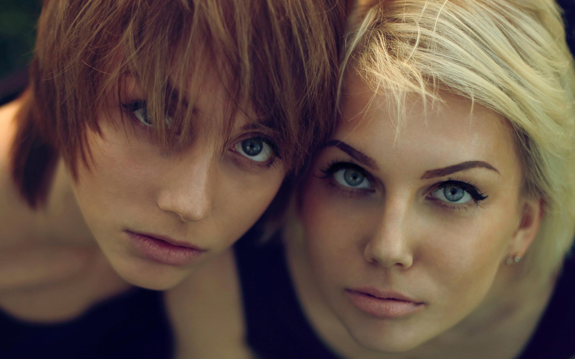 Two women, one blonde and one brunette, close-up portrait HD Wallpaper