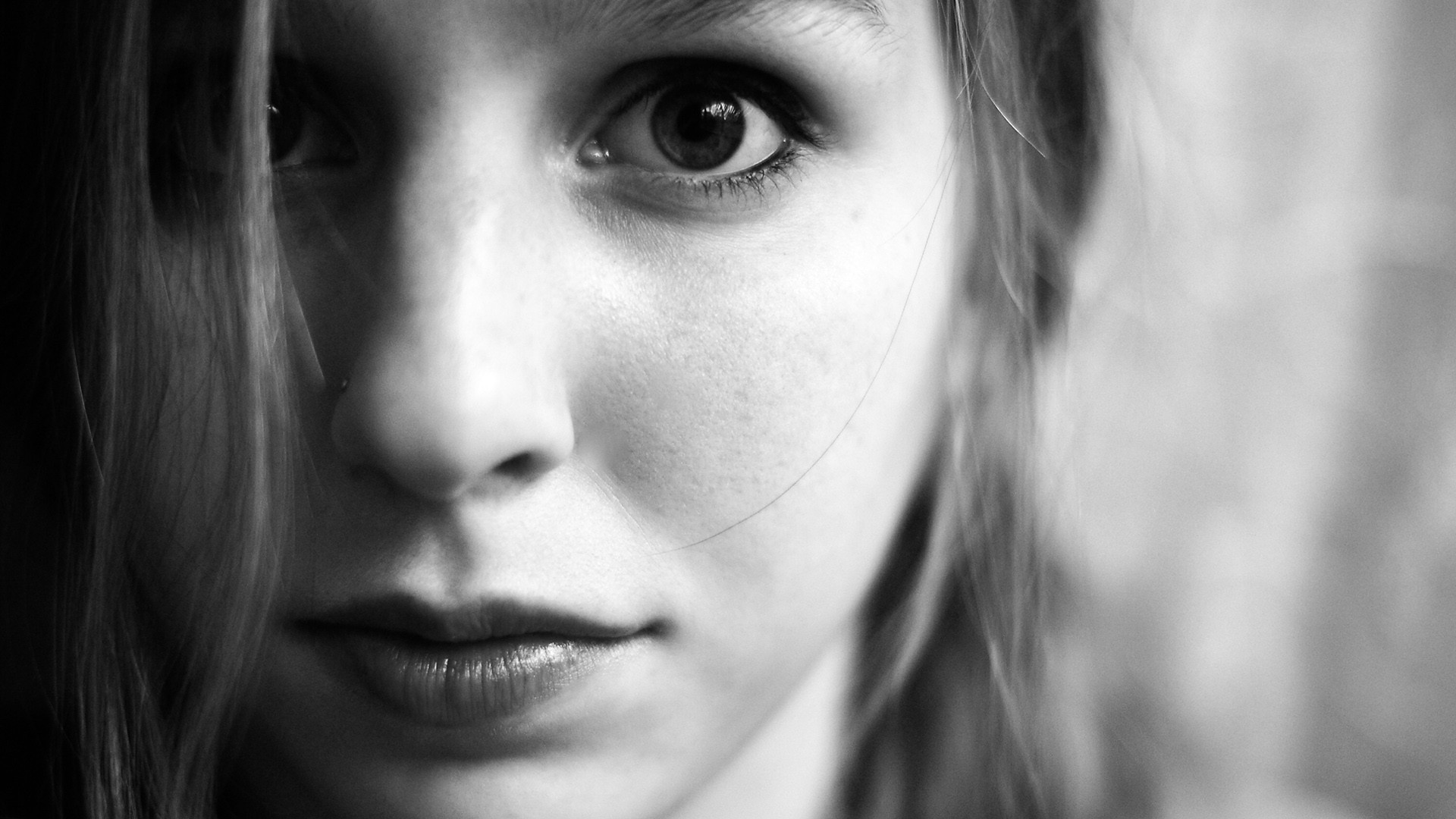 Monochrome close-up of a woman with a nose piercing HD Wallpaper