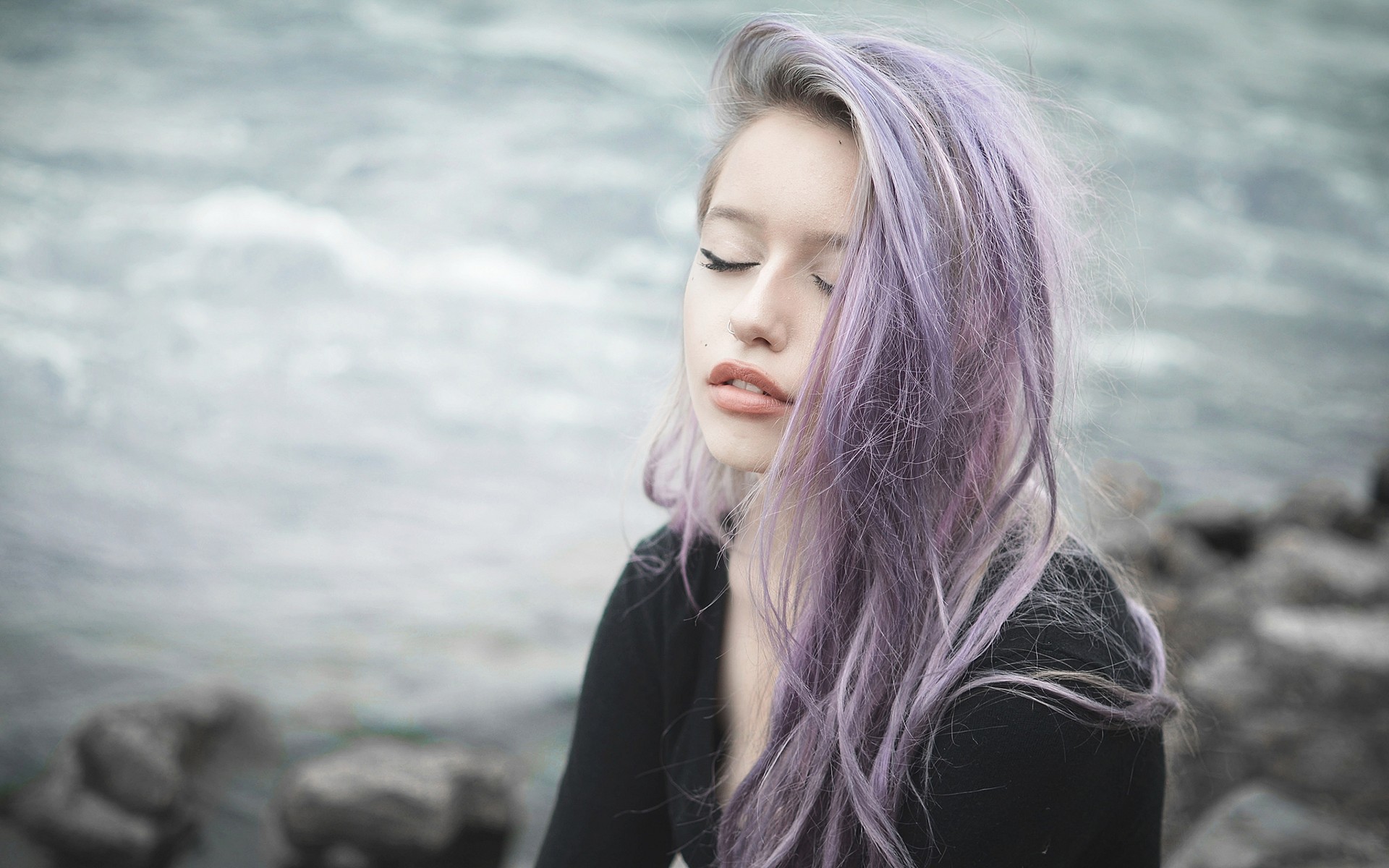 Woman with purple dyed hair by the water HD Wallpaper