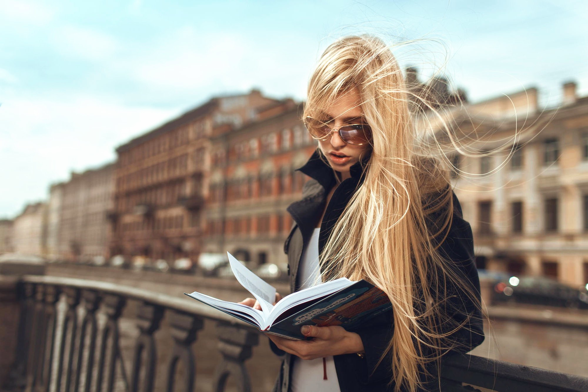 Woman with blonde hair reading a book HD Wallpaper