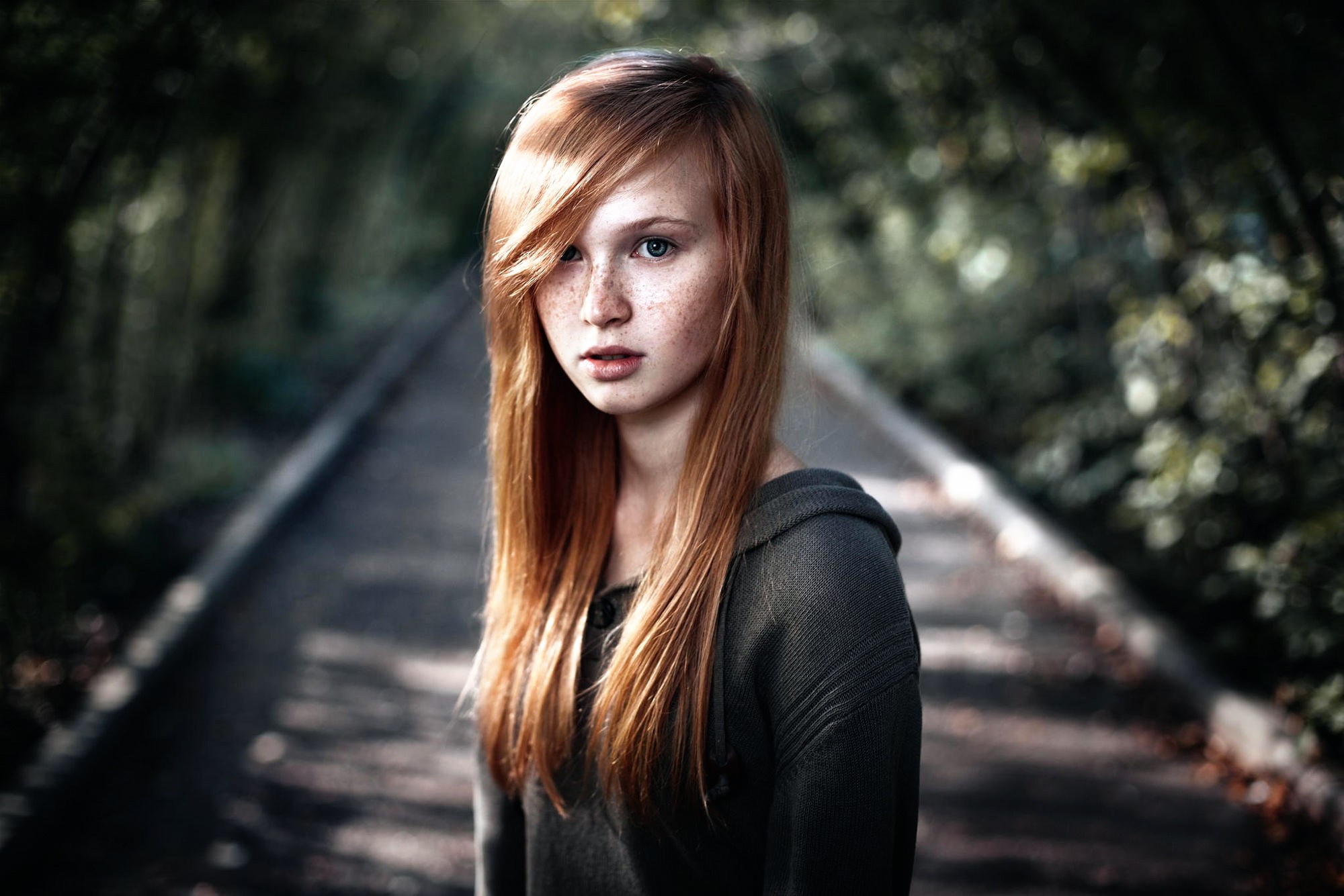 Redhead girl with freckles on a path HD Wallpaper
