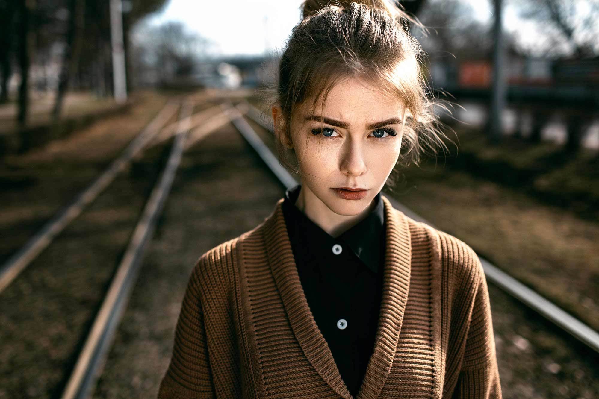 Woman on railway tracks HD Wallpaper