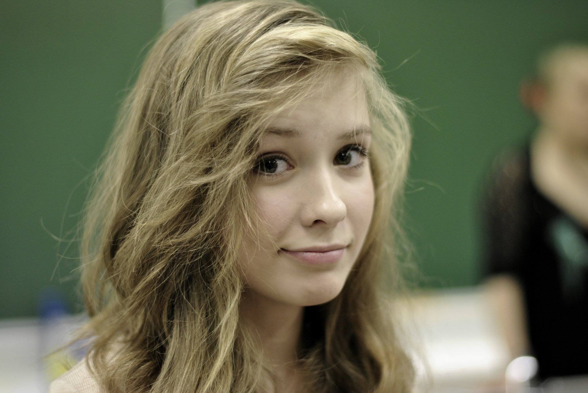 Young blonde woman looking at the viewer HD Wallpaper