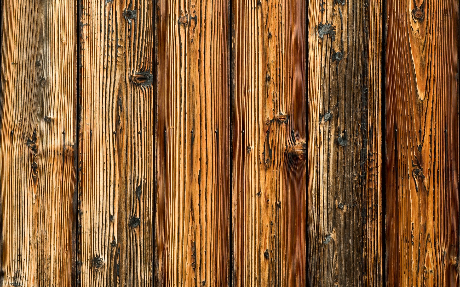Close-up of weathered wooden planks with prominent grain HD Wallpaper