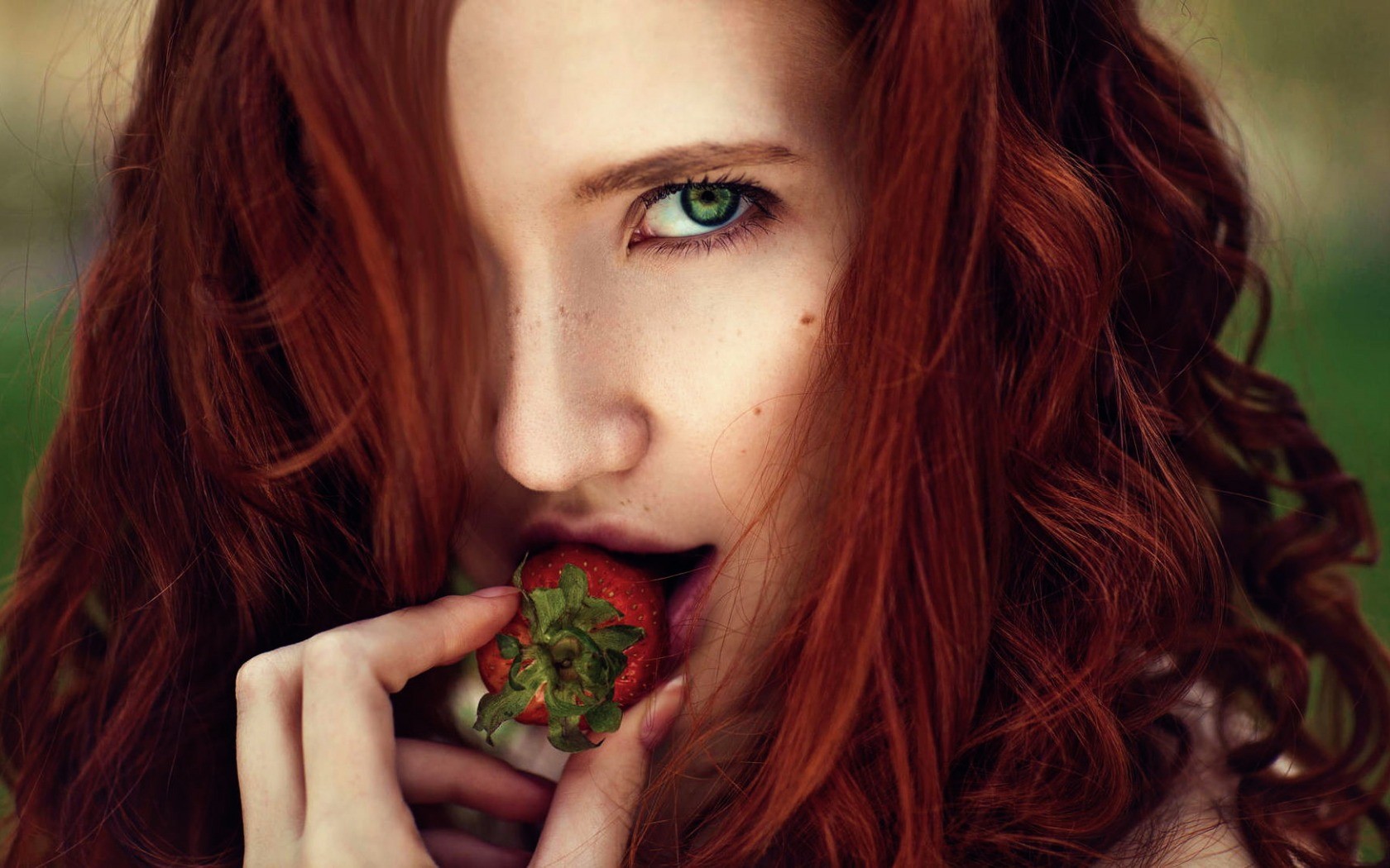 Redhead woman eating a strawberry HD Wallpaper