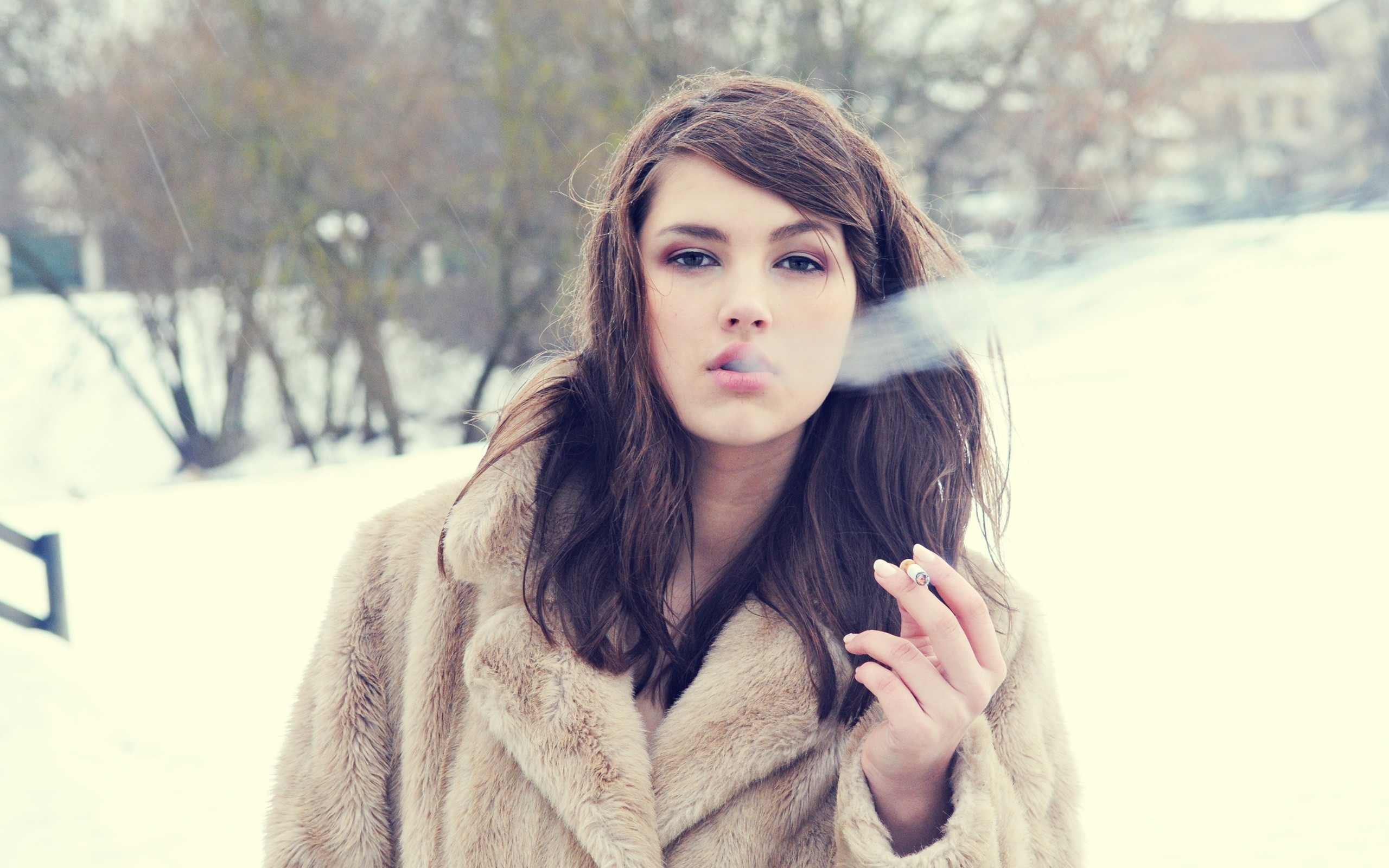 Woman in fur coat smoking in winter HD Wallpaper