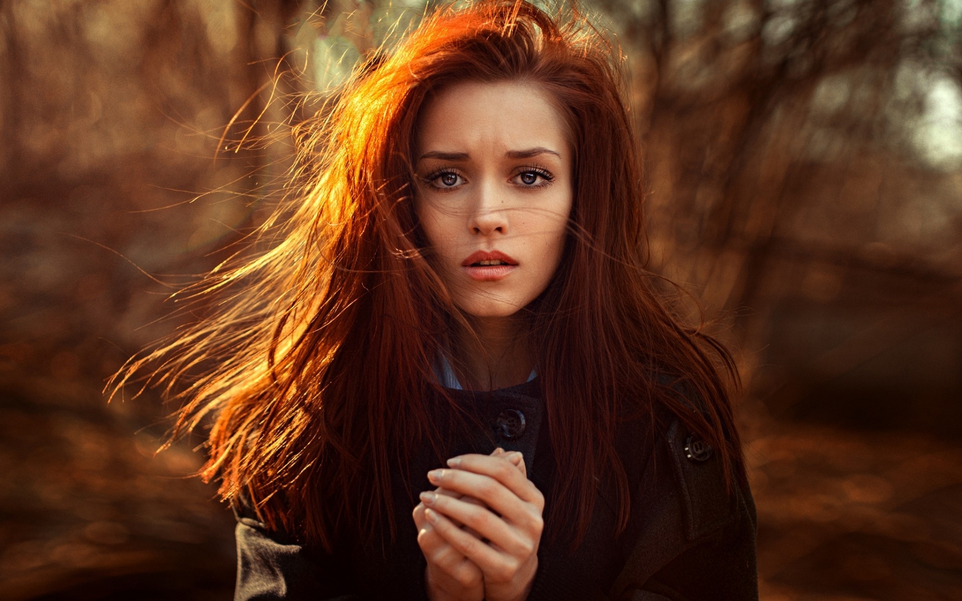 Redhead woman looking at viewer in black coat HD Wallpaper