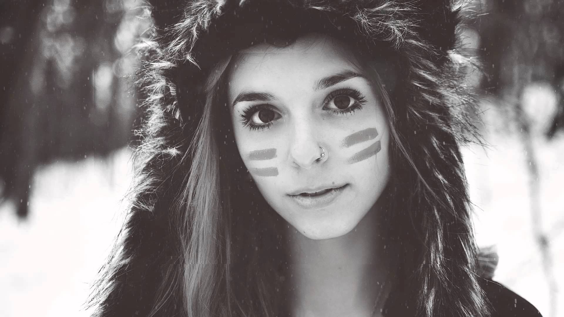 Woman with face paint and fluffy hat in winter HD Wallpaper