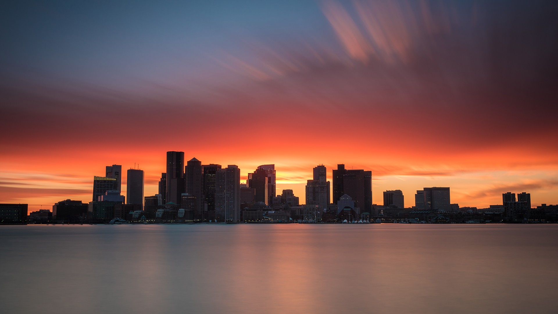 Boston skyline at sunset with long exposure clouds HD Wallpaper