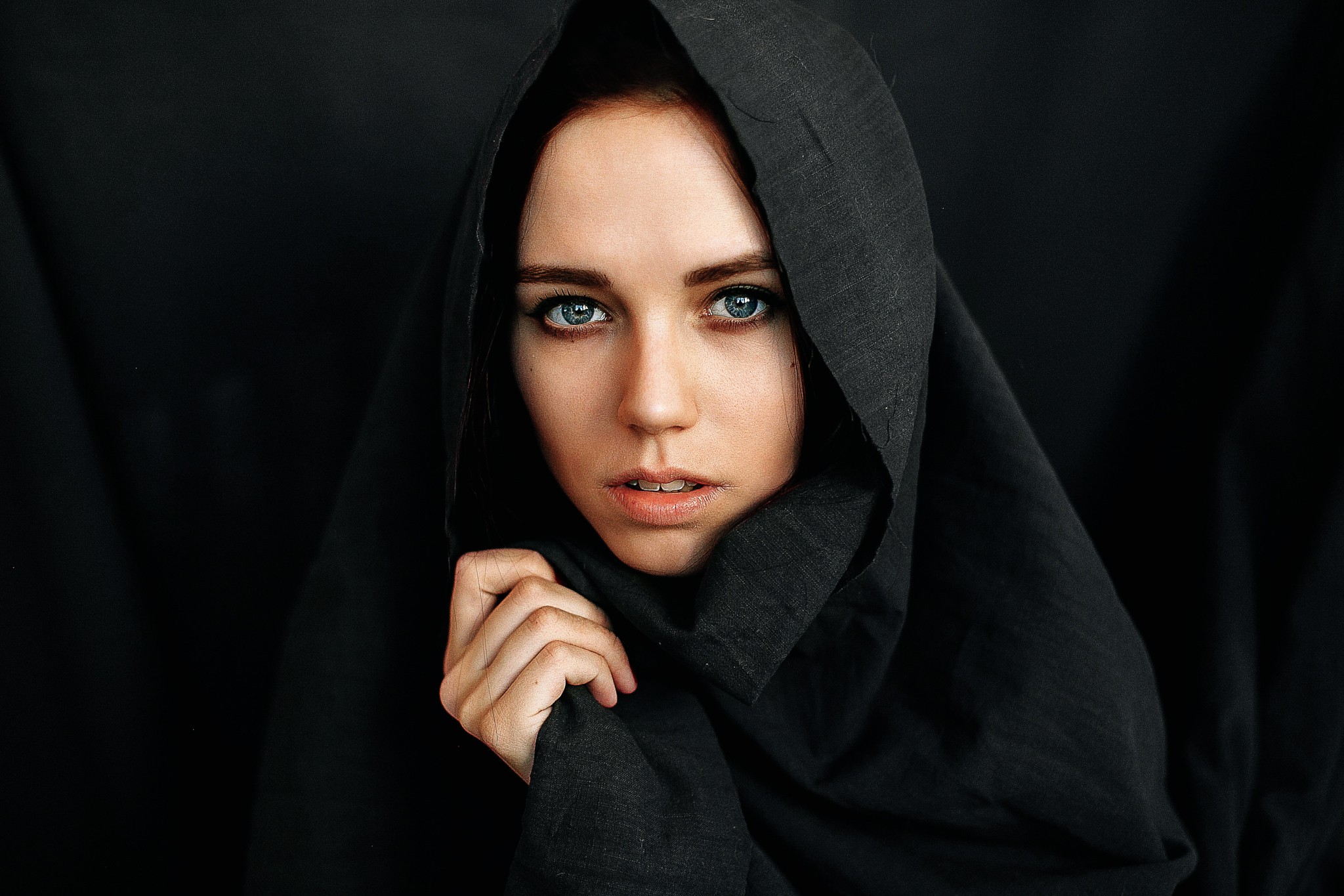 Woman in black headscarf looking at viewer HD Wallpaper