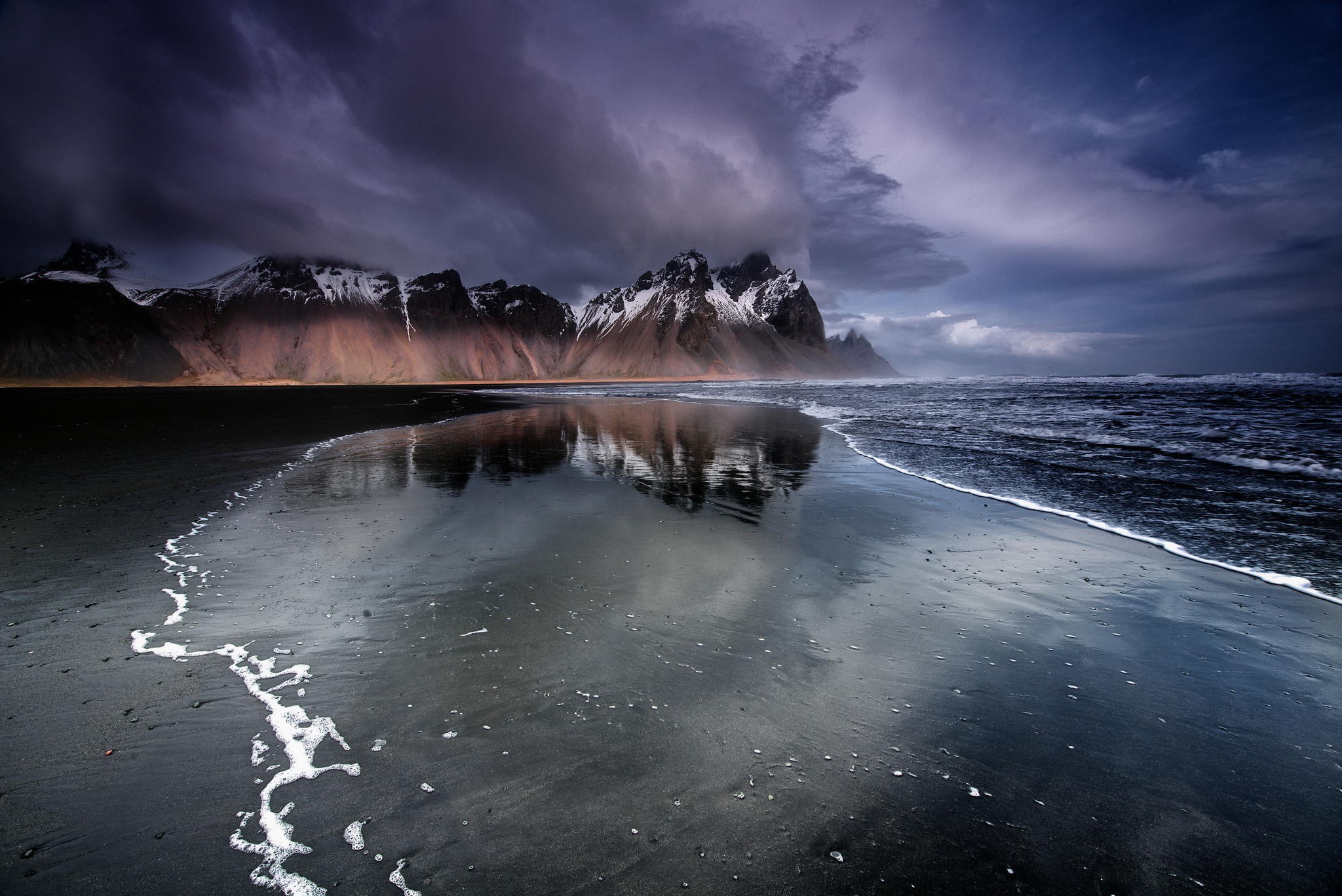 Black sand beach with mountains in Iceland HD Wallpaper