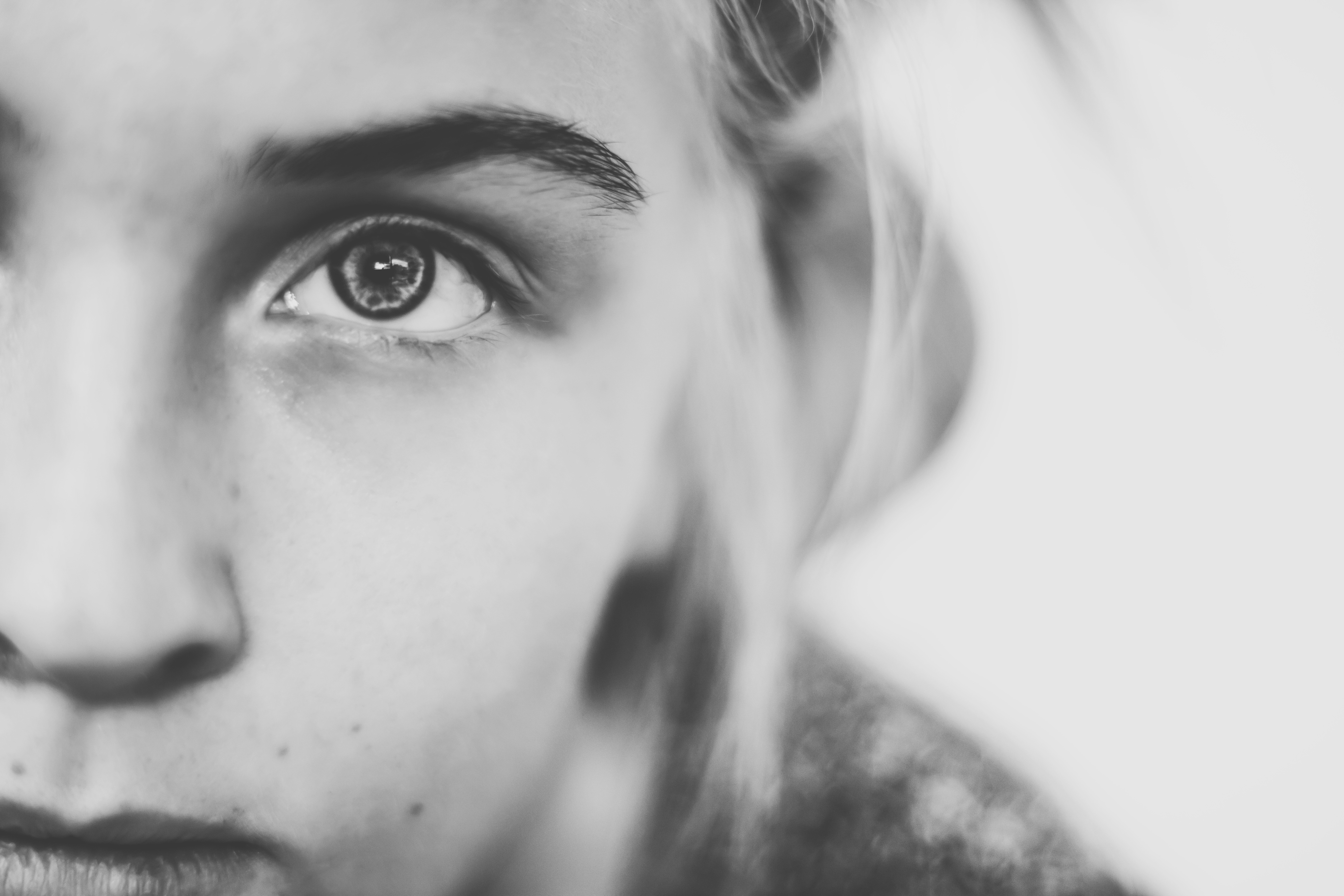 Monochrome close-up portrait of a woman's eye HD Wallpaper