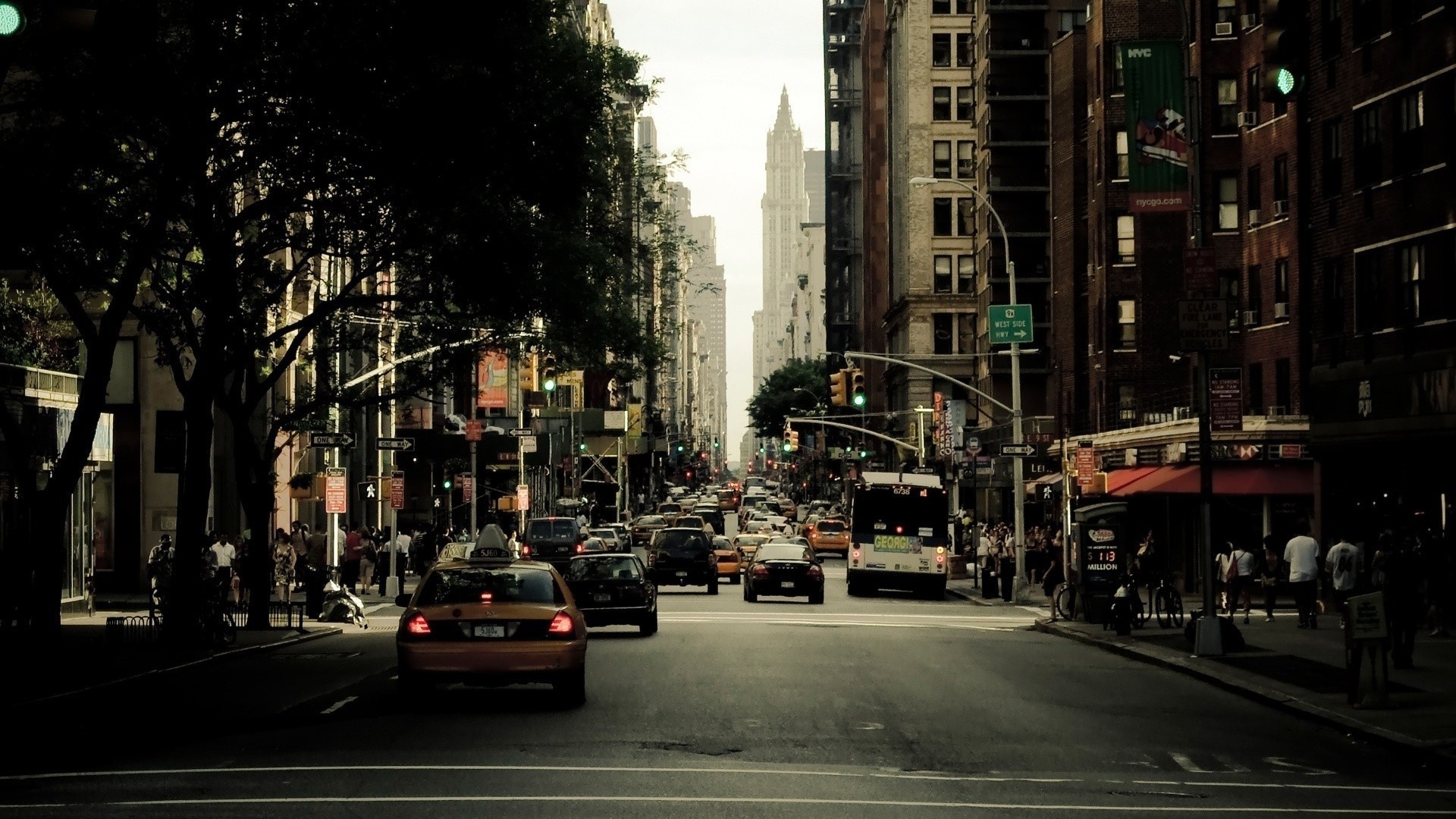 New York City street with taxis and buildings HD Wallpaper