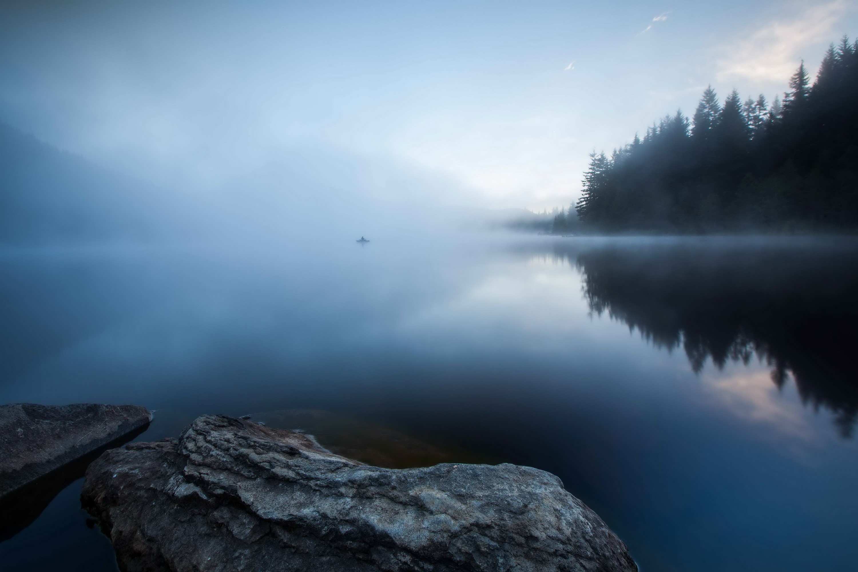 Misty lake with rocks and trees HD Wallpaper