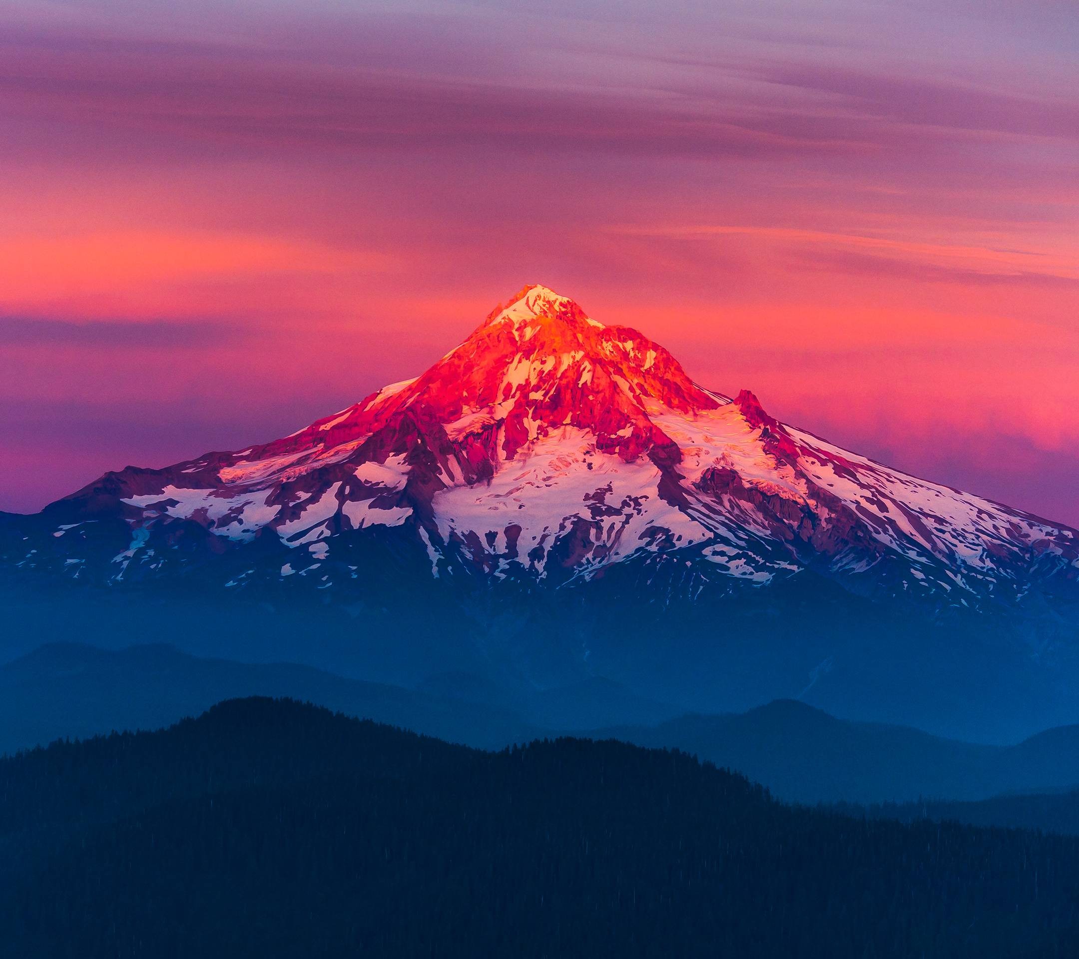 Snow-capped mountain peak at sunset HD Wallpaper
