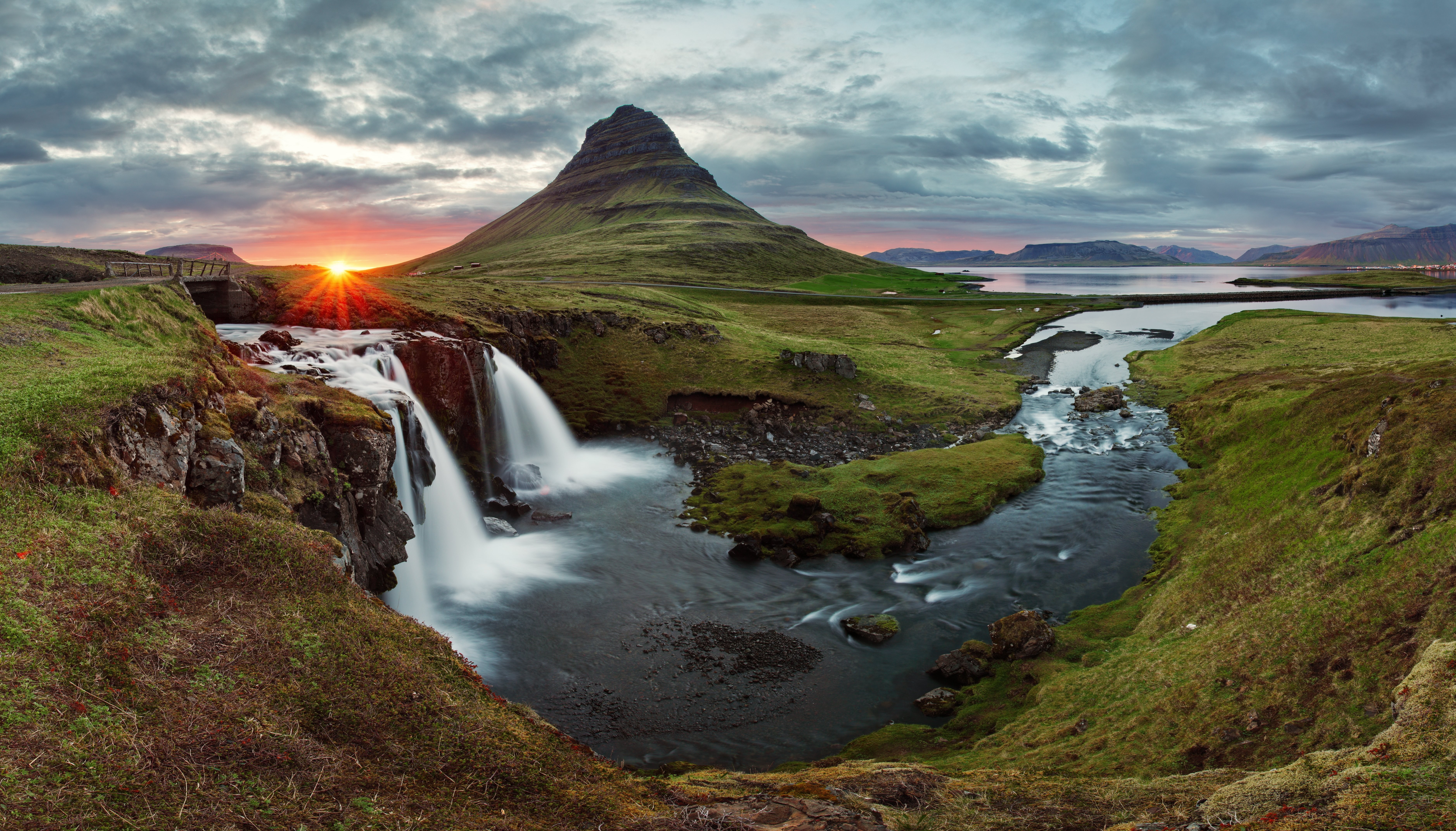 Kirkjufell mountain and waterfall at sunset in Iceland HD Wallpaper