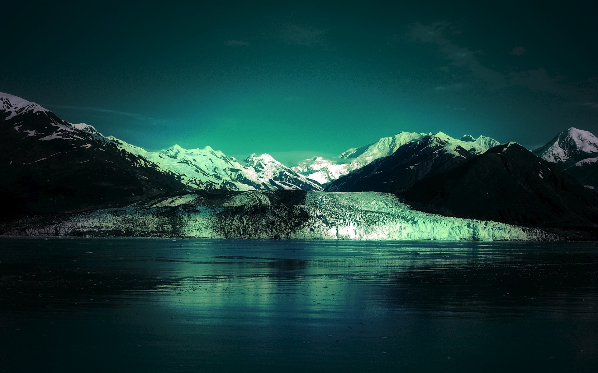Glacier and snow-capped mountains reflected in dark water HD Wallpaper