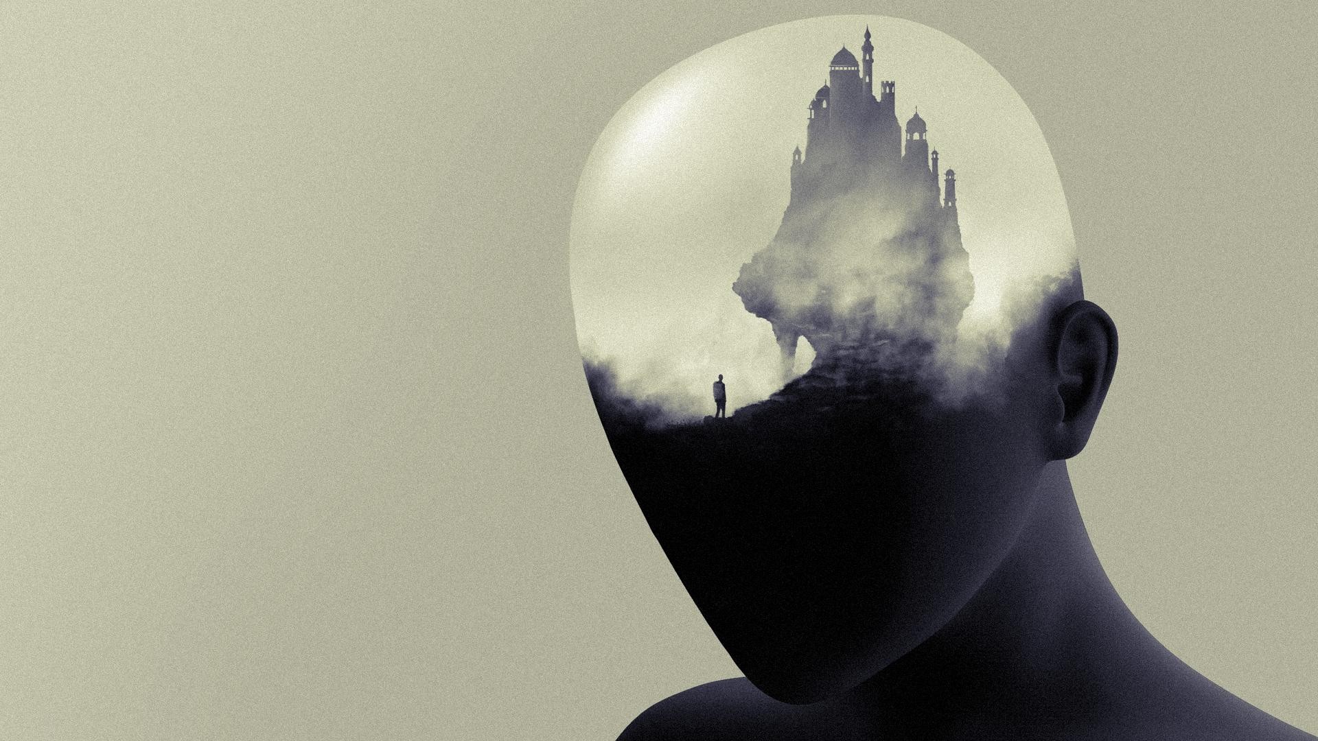 Castle on a misty mountain inside a silhouette head HD Wallpaper