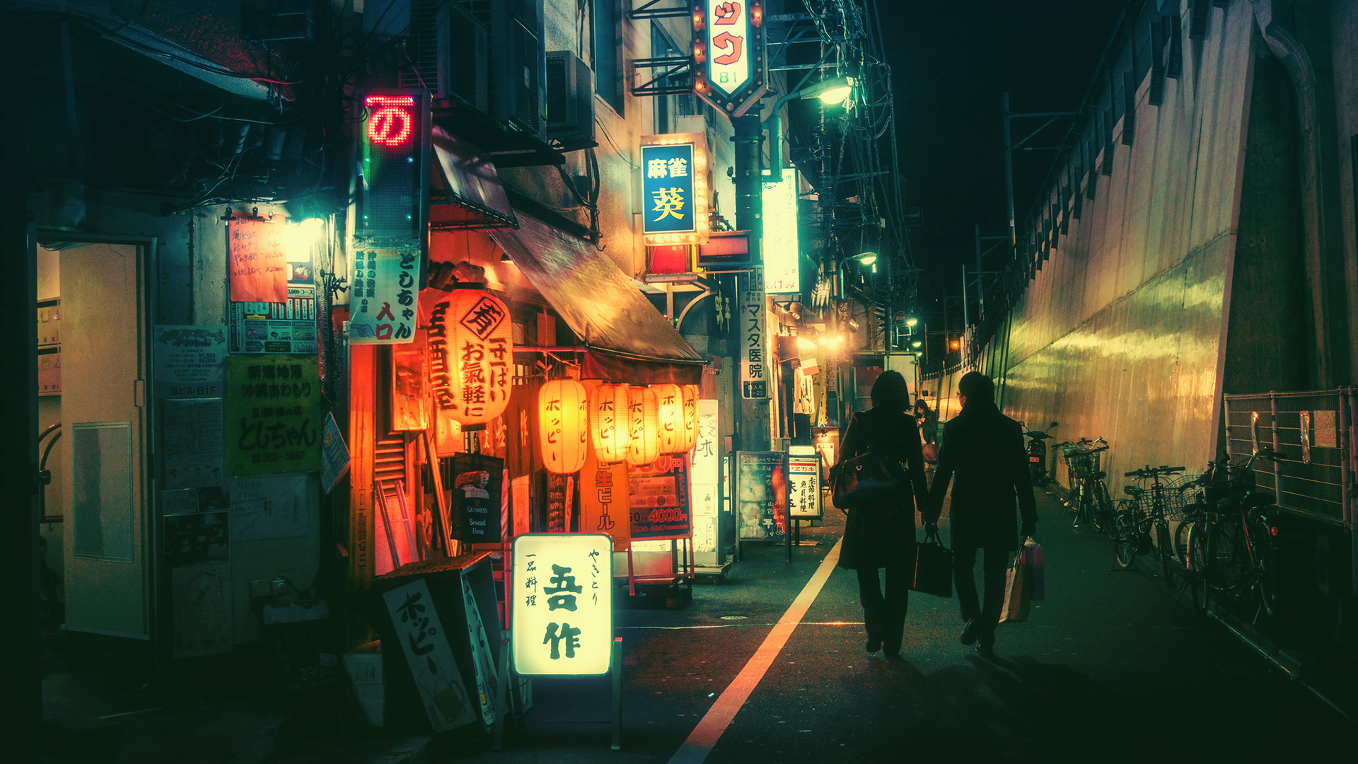 Couple walking down a neon-lit Japanese backstreet at night HD Wallpaper