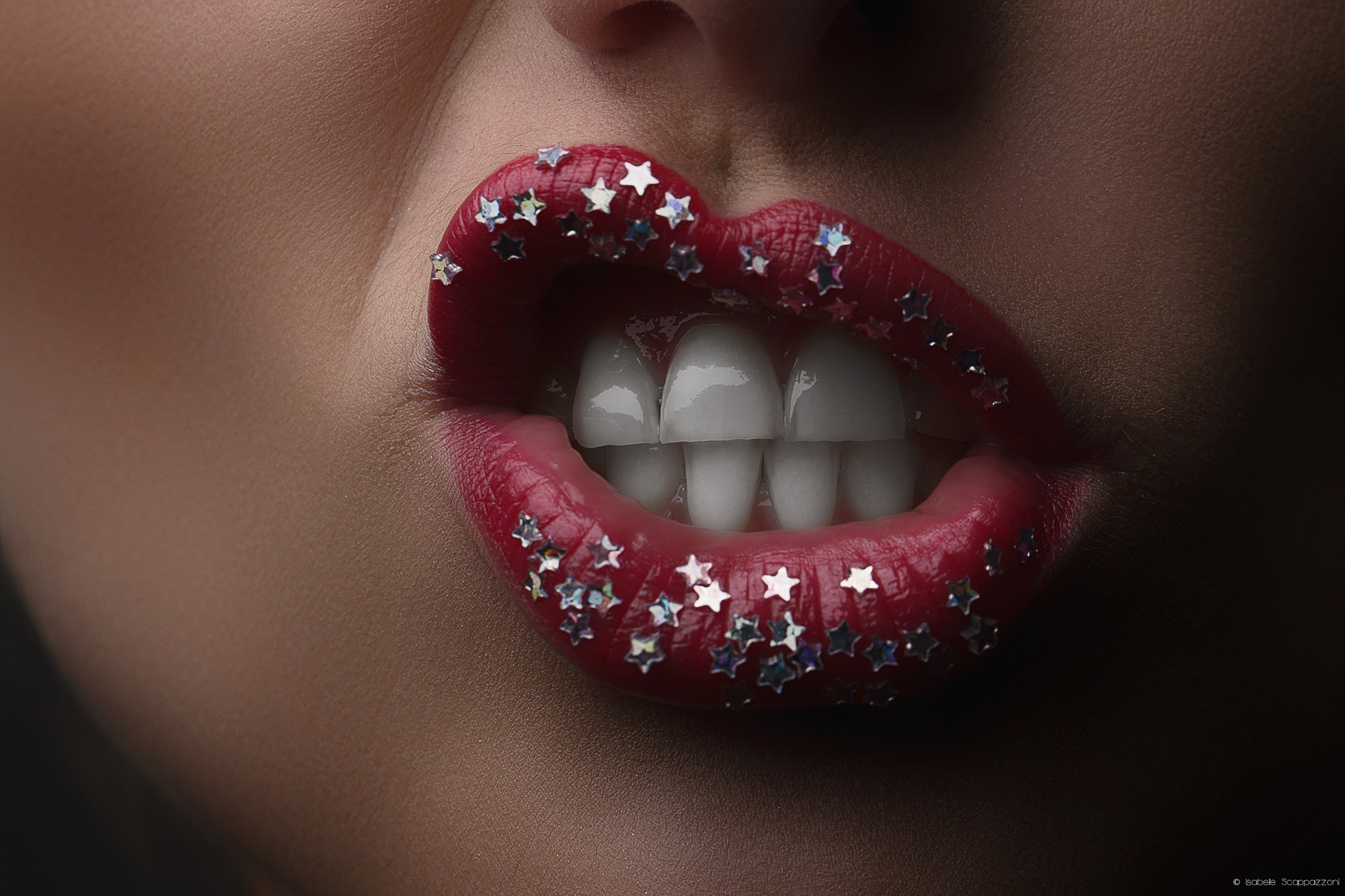 Woman with red lipstick and star glitter HD Wallpaper