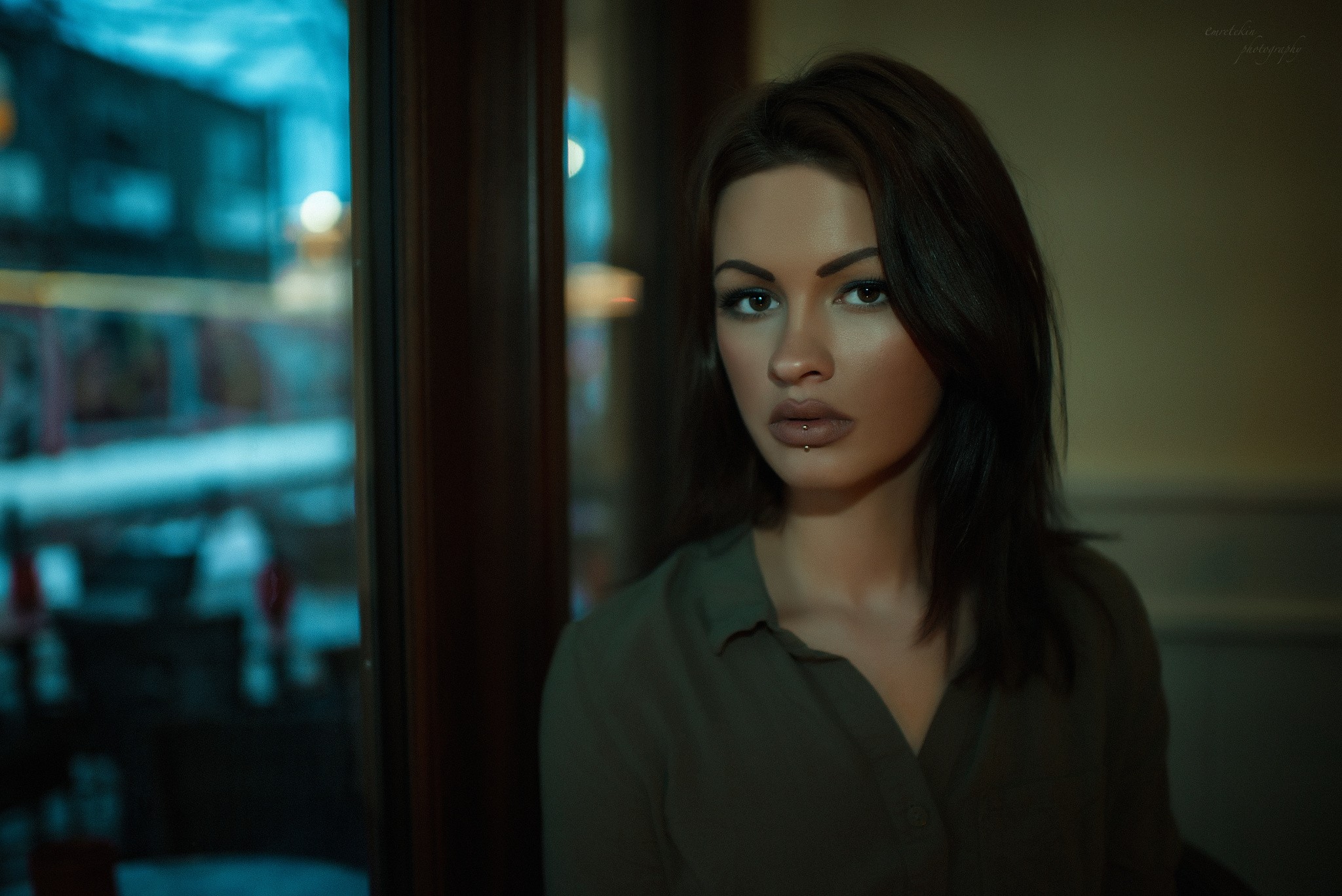 Woman with pierced lip looking at viewer HD Wallpaper