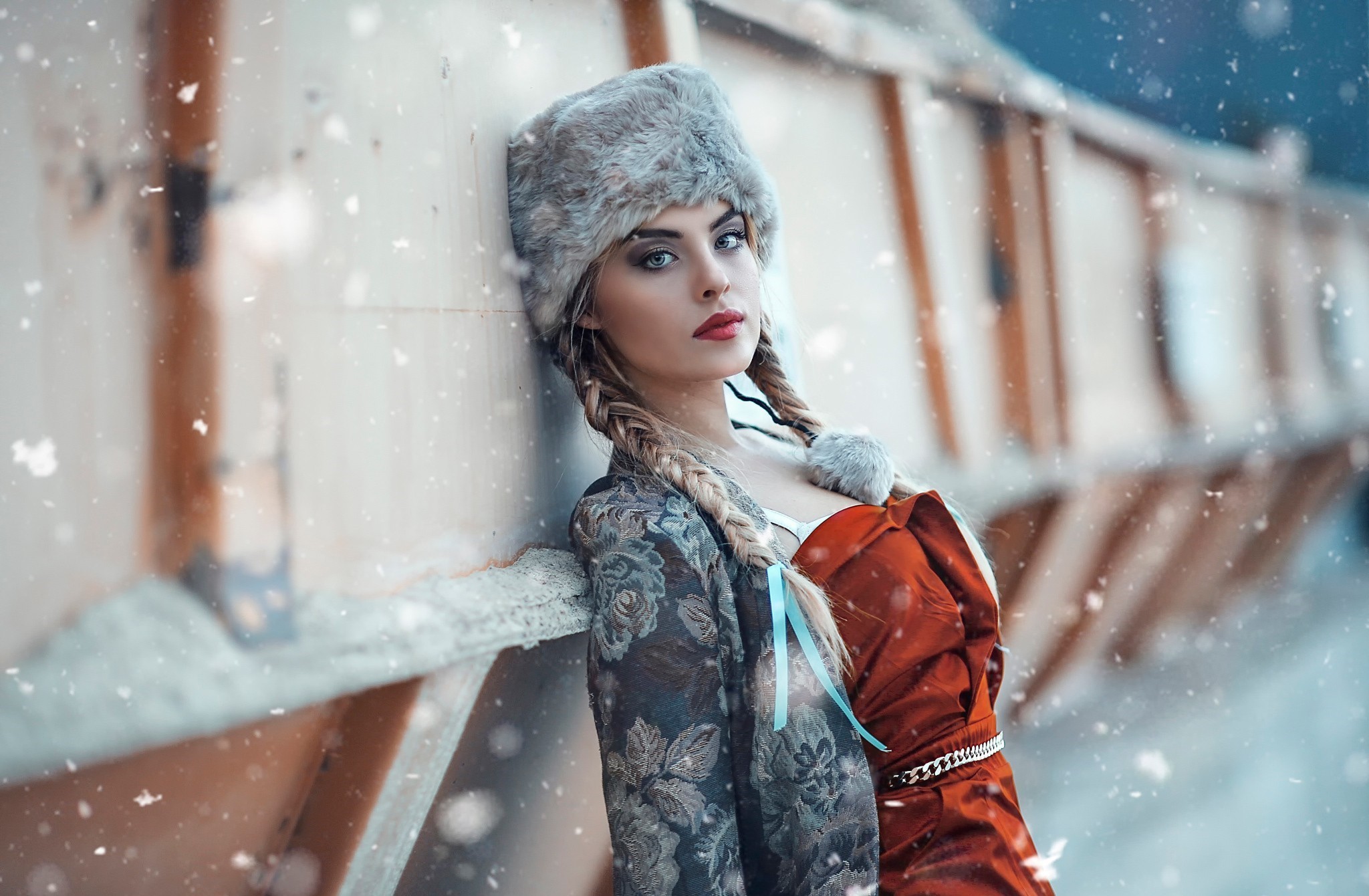 Woman in fur hat and winter clothes in snow HD Wallpaper